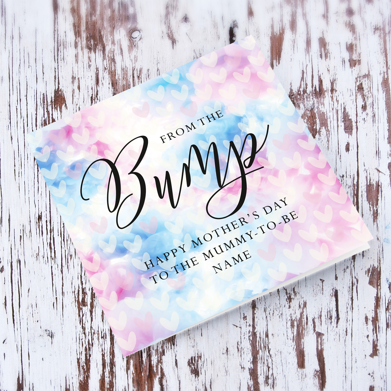 A cute mother's day card for the mummy to be from the bump, featuring a colourful two toned background with scattered hearts in English (Personalisable)