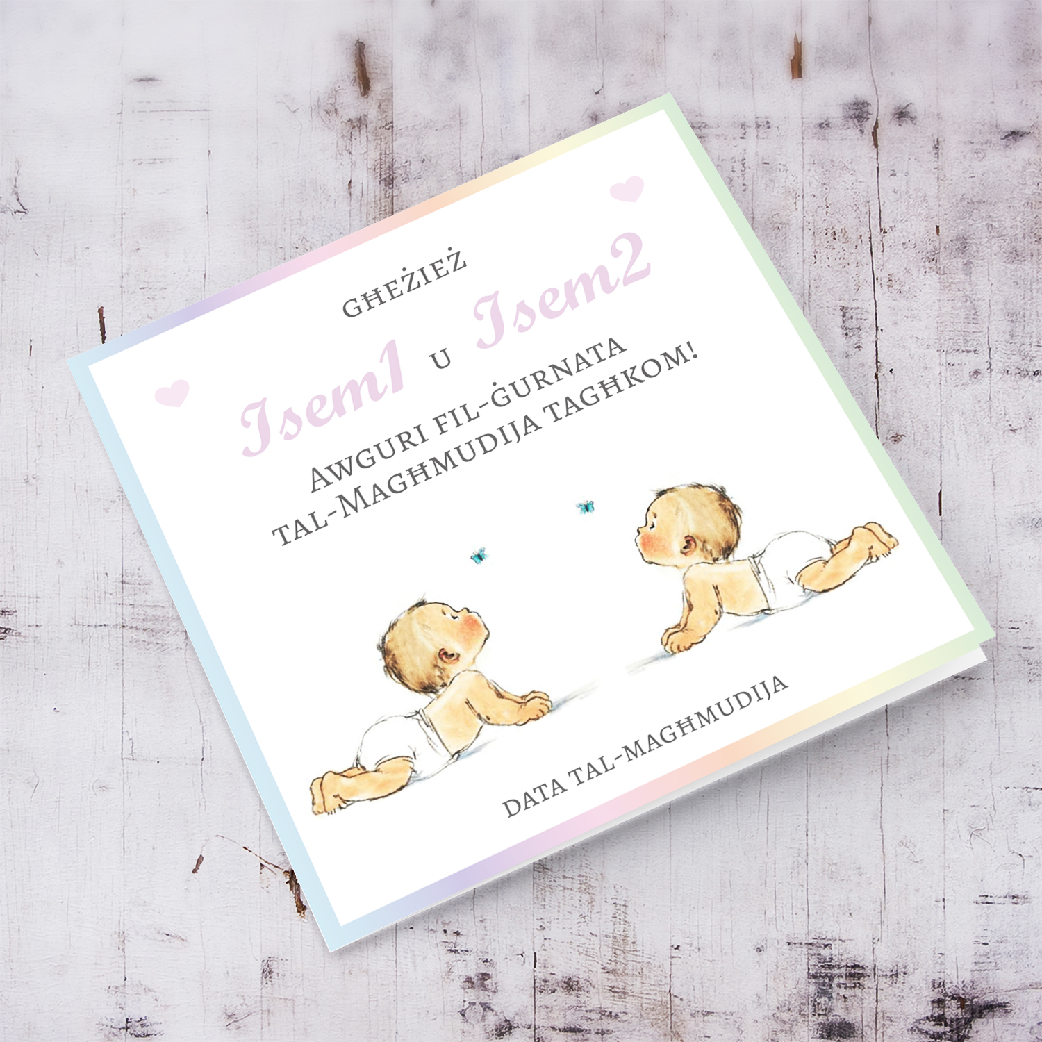 Twin baptism card for girls in pink font, and pastel border personalisable in Maltese