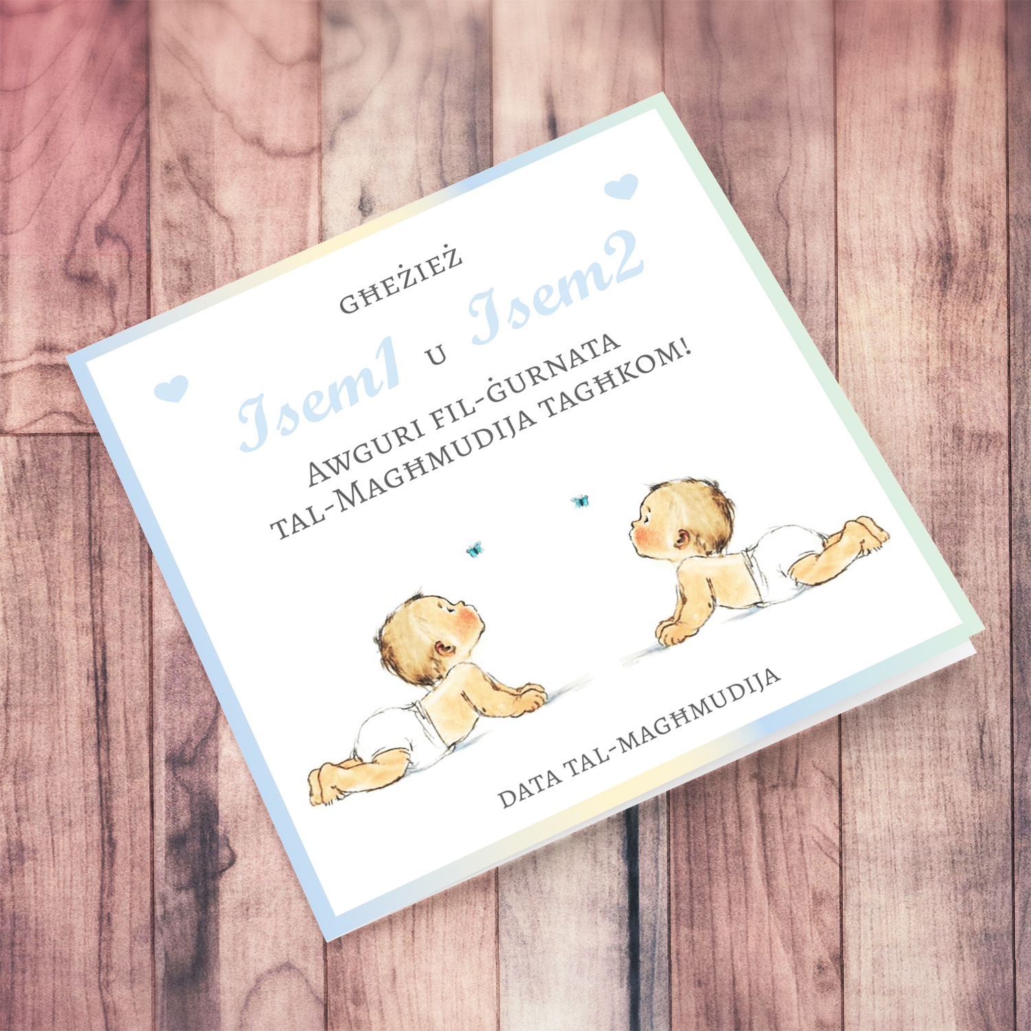 Twin baptism card for boys in light blue font, and pastel border personalisable in Maltese