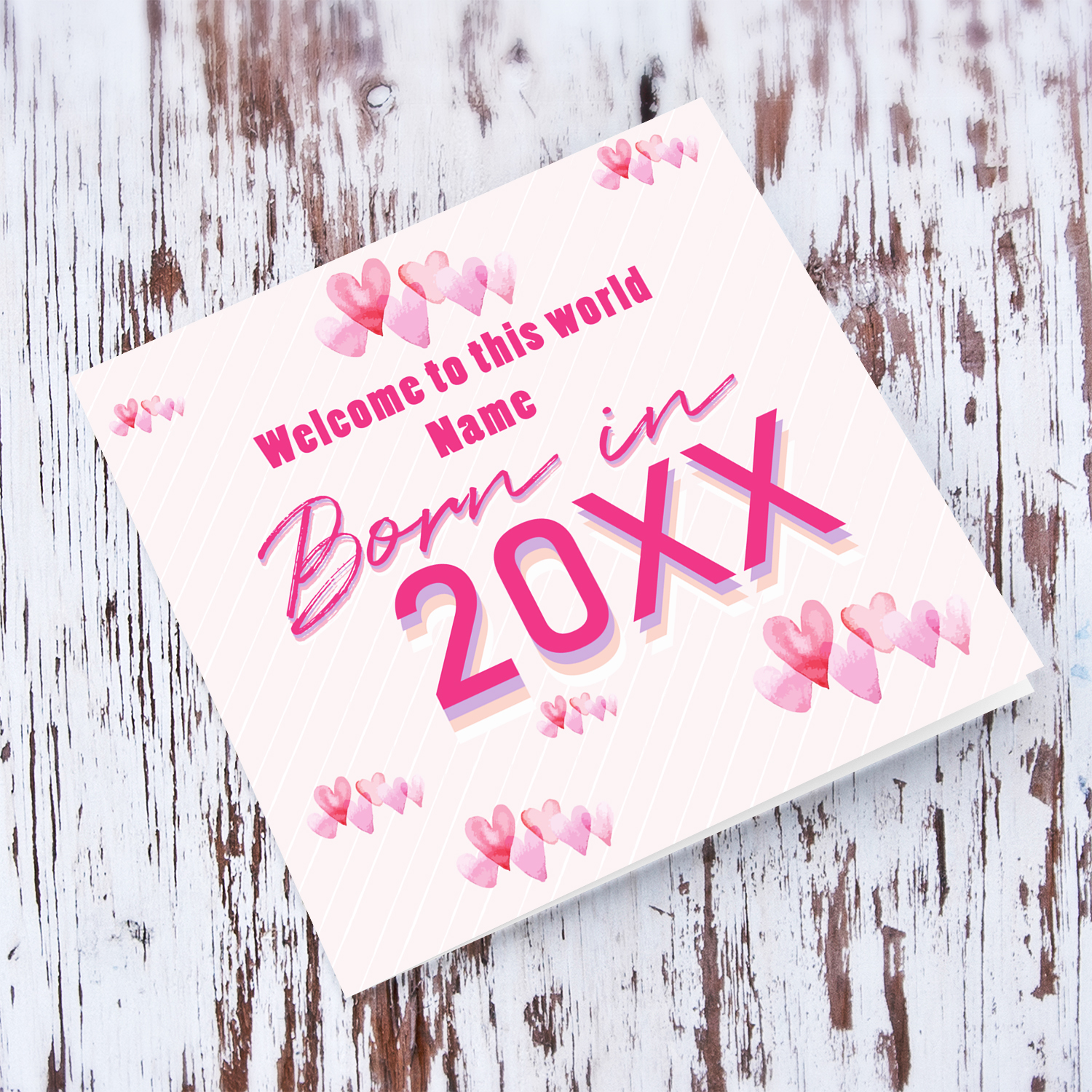 Born in 2024 card for new born girl with scattered pink hearts in English (PErsonalisable)