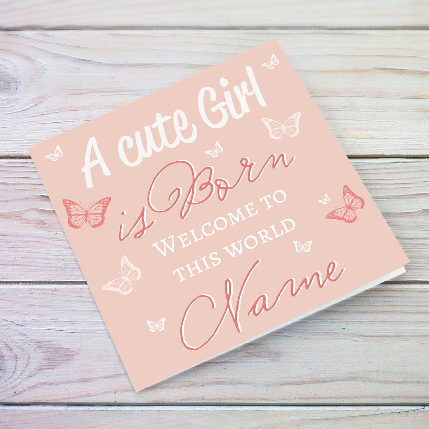 A cute baby girl is born - New born greeting card for girls in light pink background and scattered butterflies in English