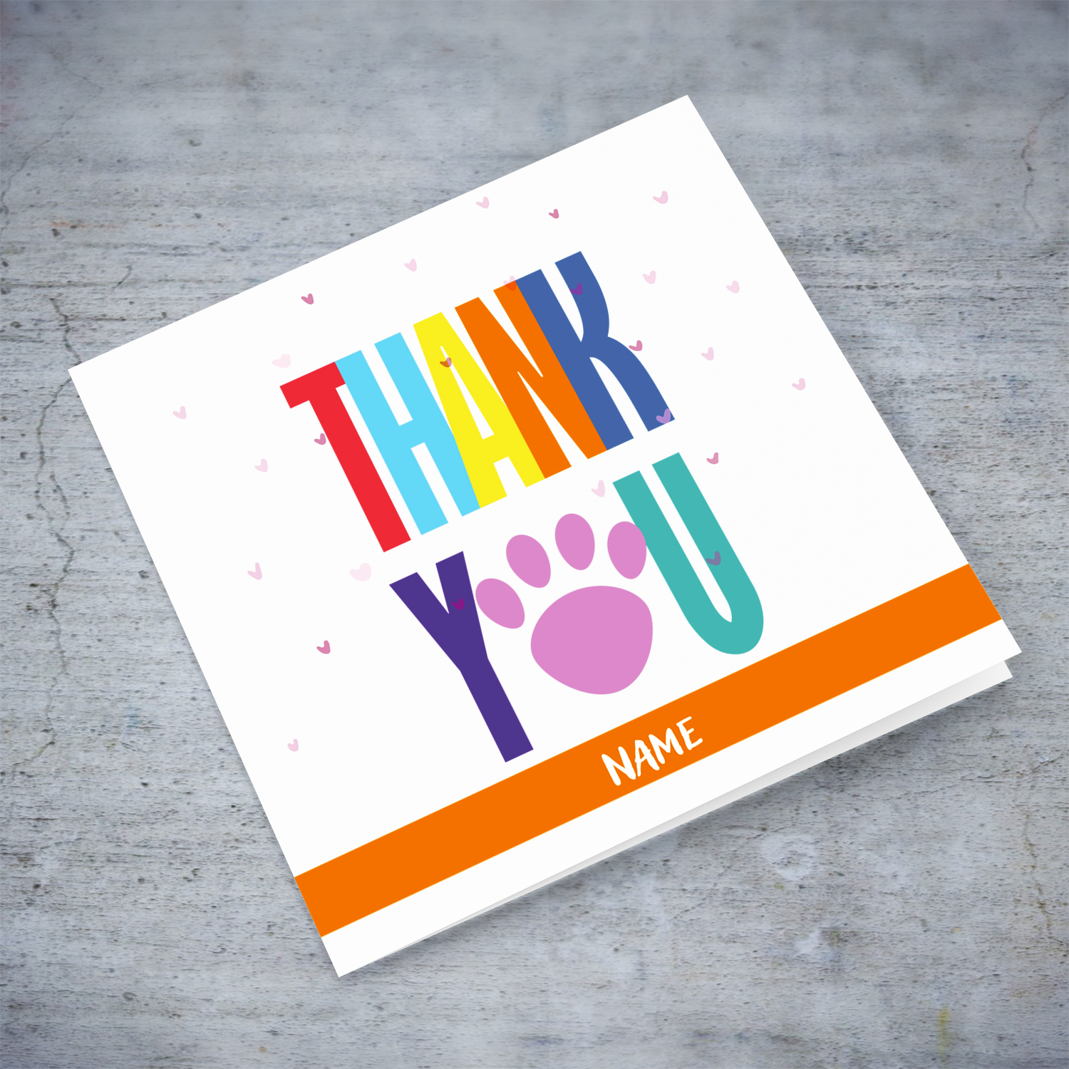 Colourful thank you card with paw print and scattered hearts in English