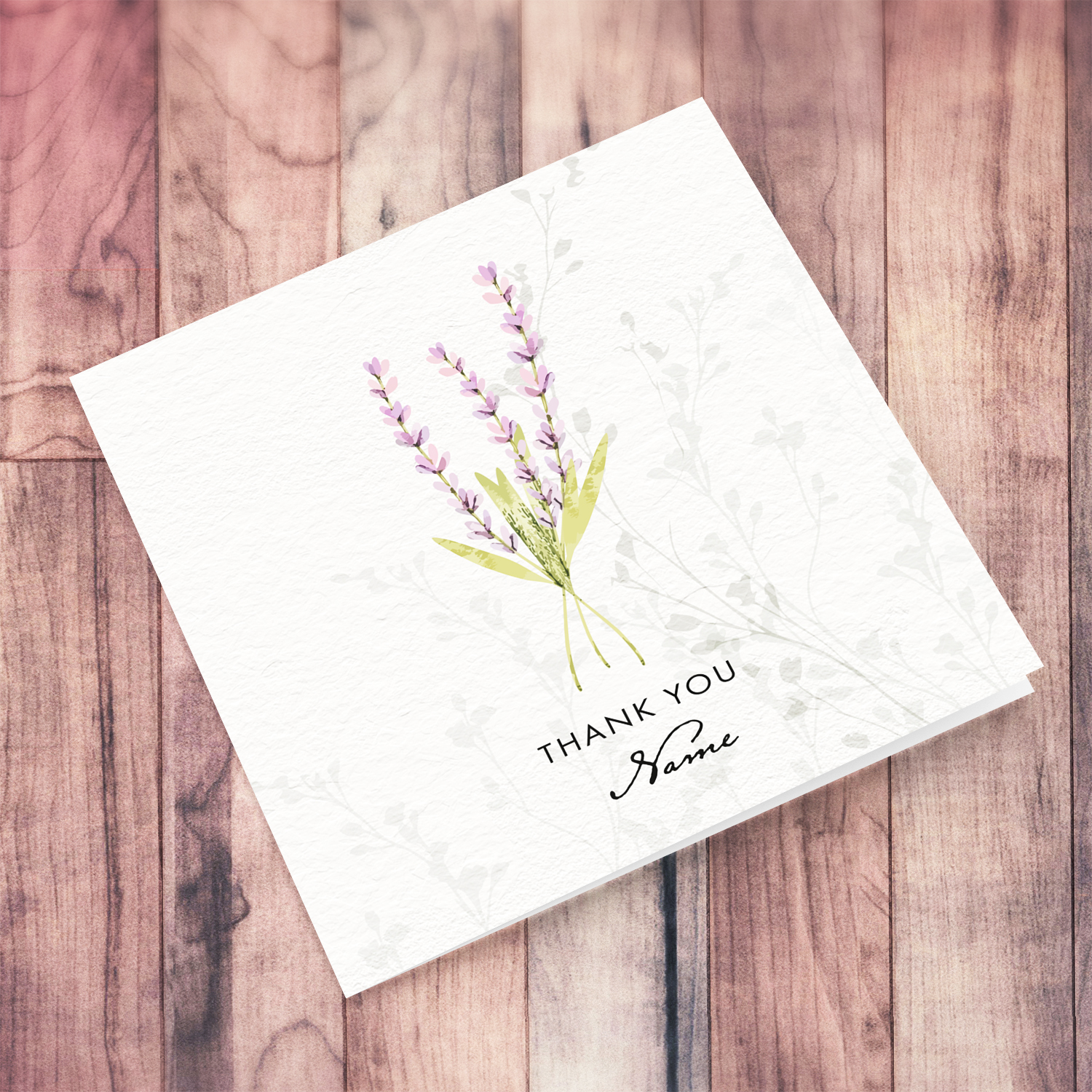 A dainty minimalist thank you card featuring a light pink/purple floral detail in English