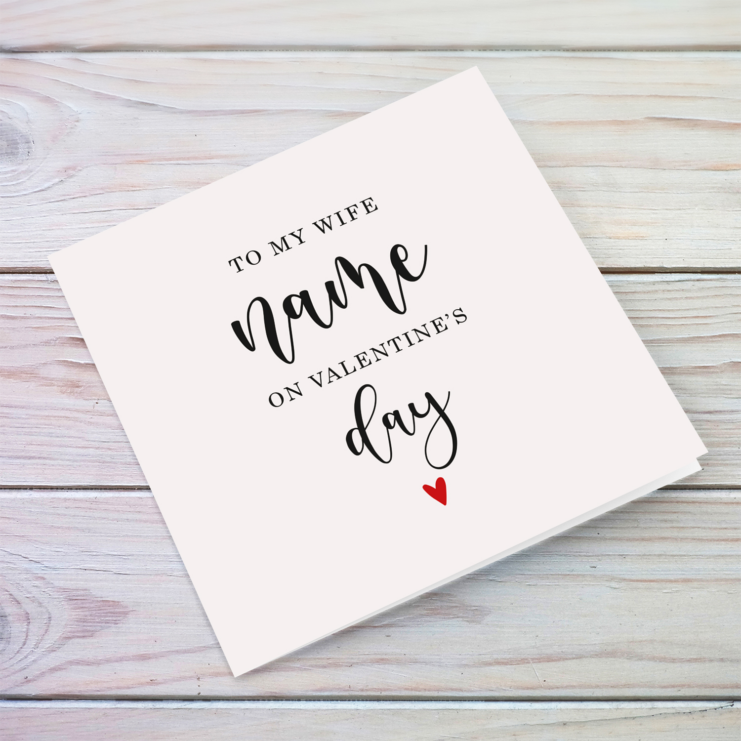To my wife on Valentine's Day greeting card in neutral background with red heart in English