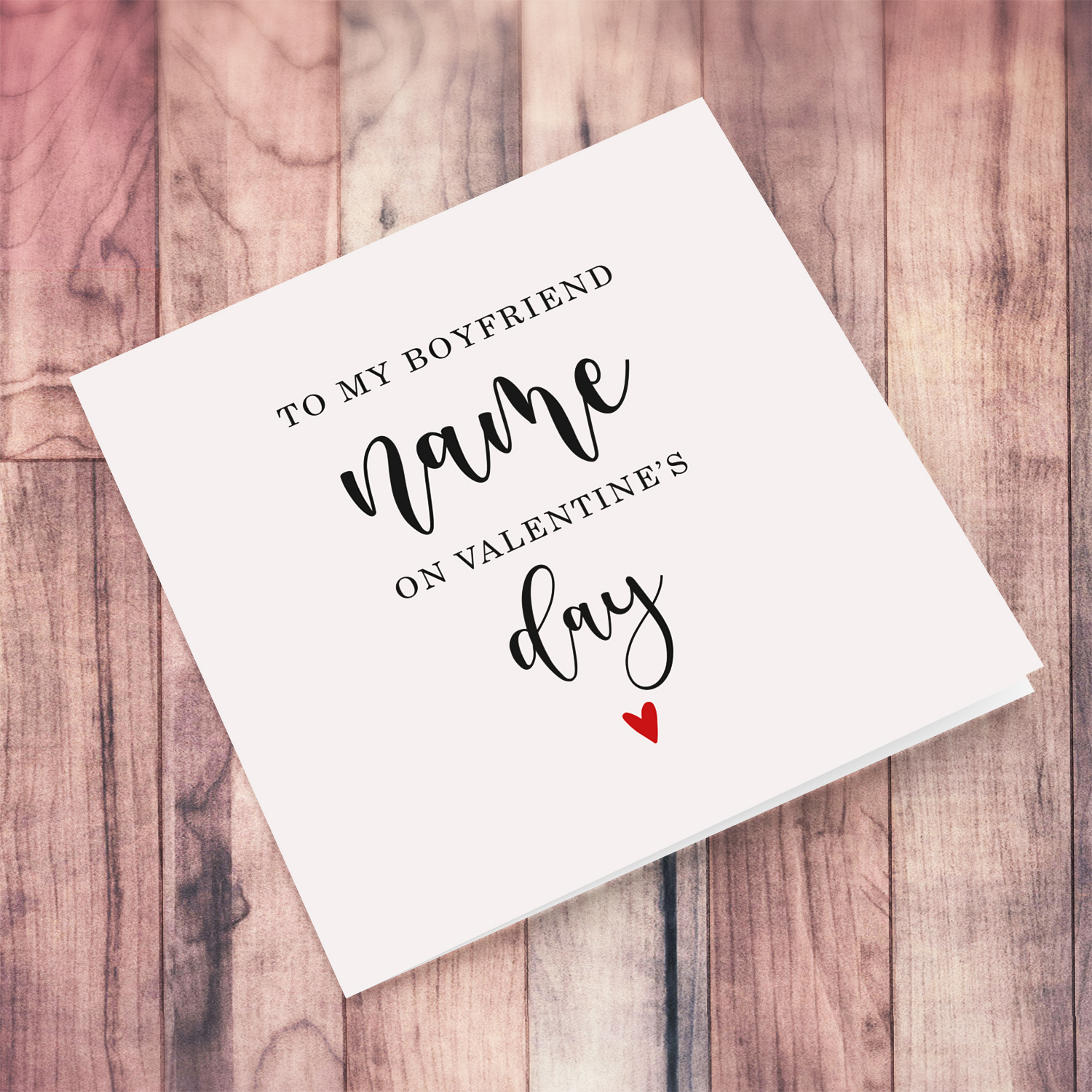 To my boyfriend on Valentine's Day greeting card in neutral background with red heart in English