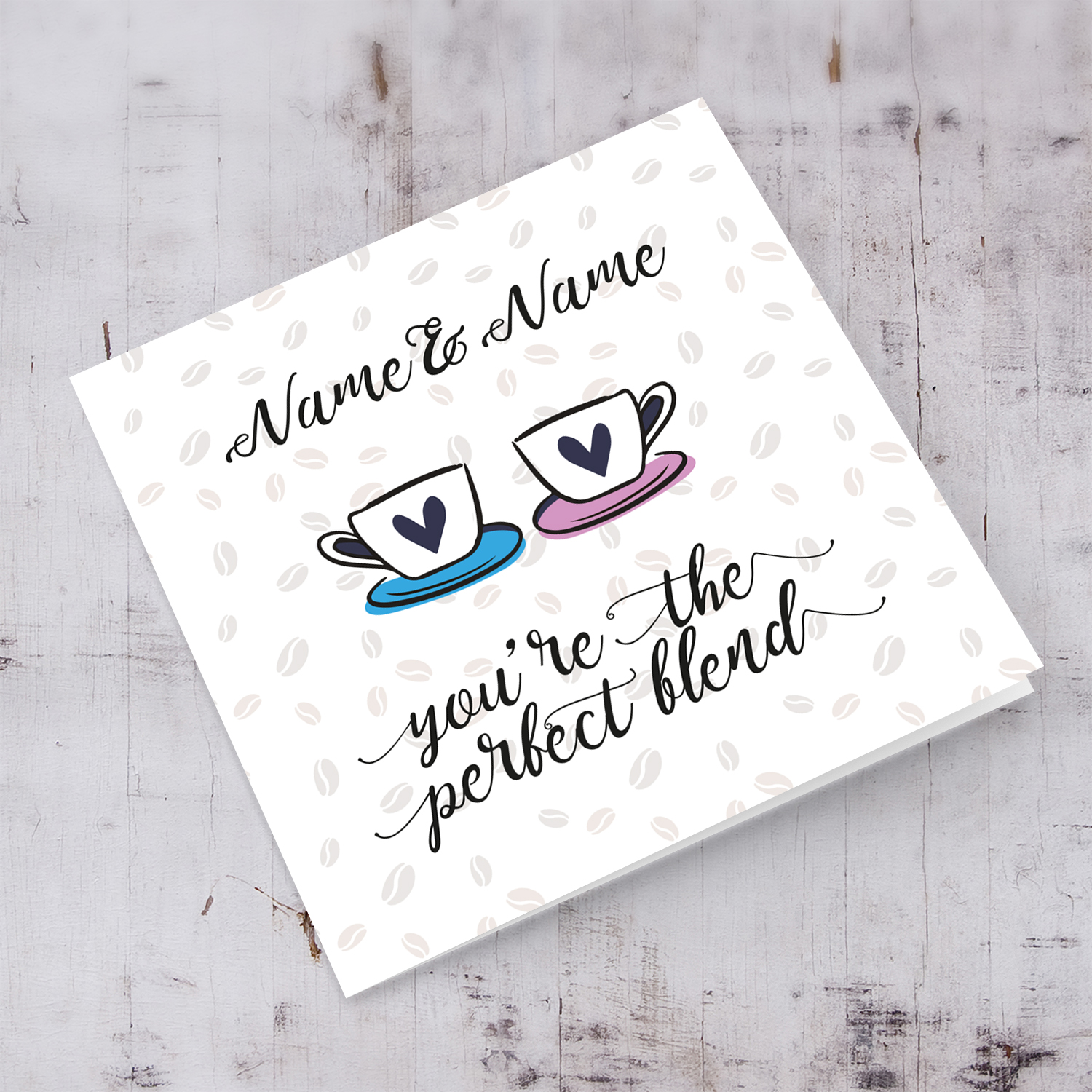 Cup themed personalisable wedding / engagement card with scattered coffee beans in the background in English
