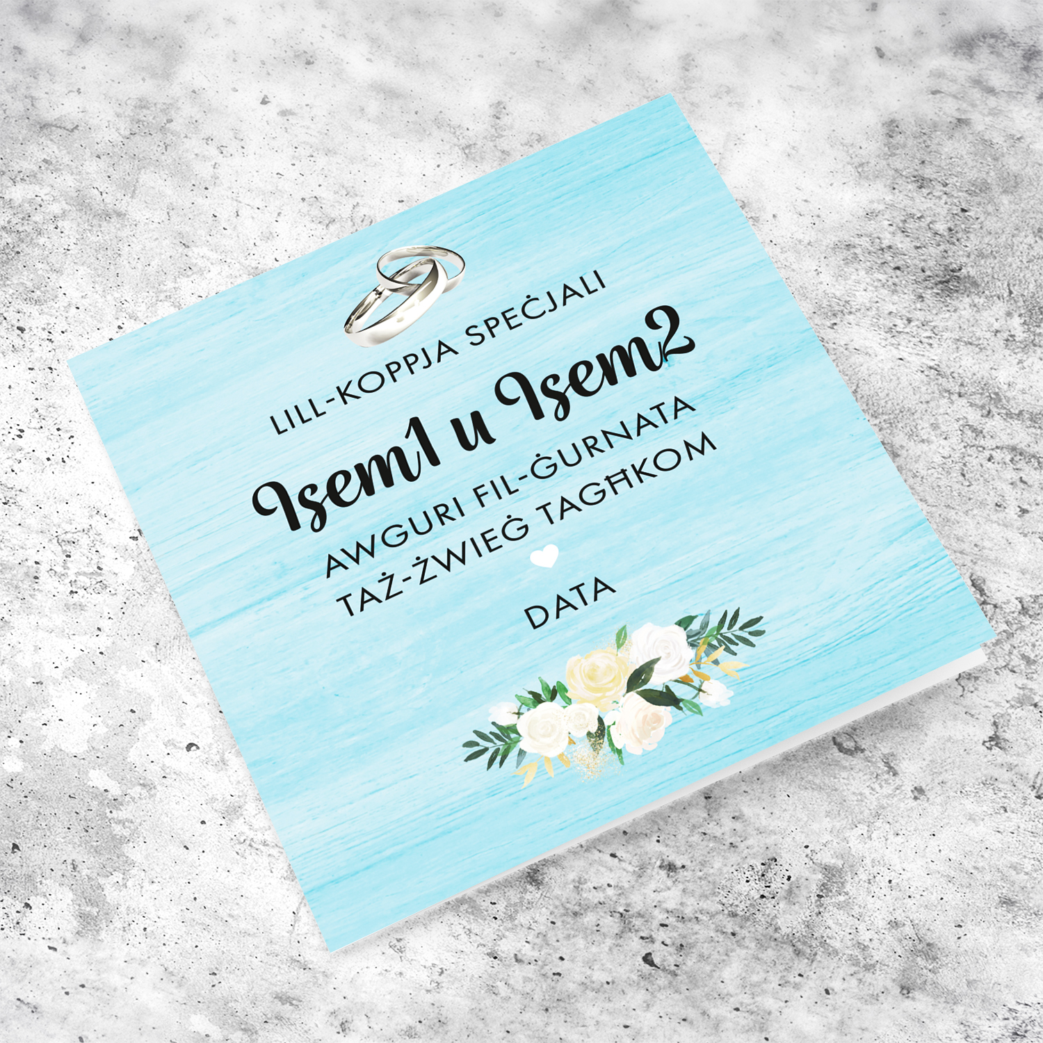 Light blue background wedding card with wedding bands and white flowers for a special couple in Maltese