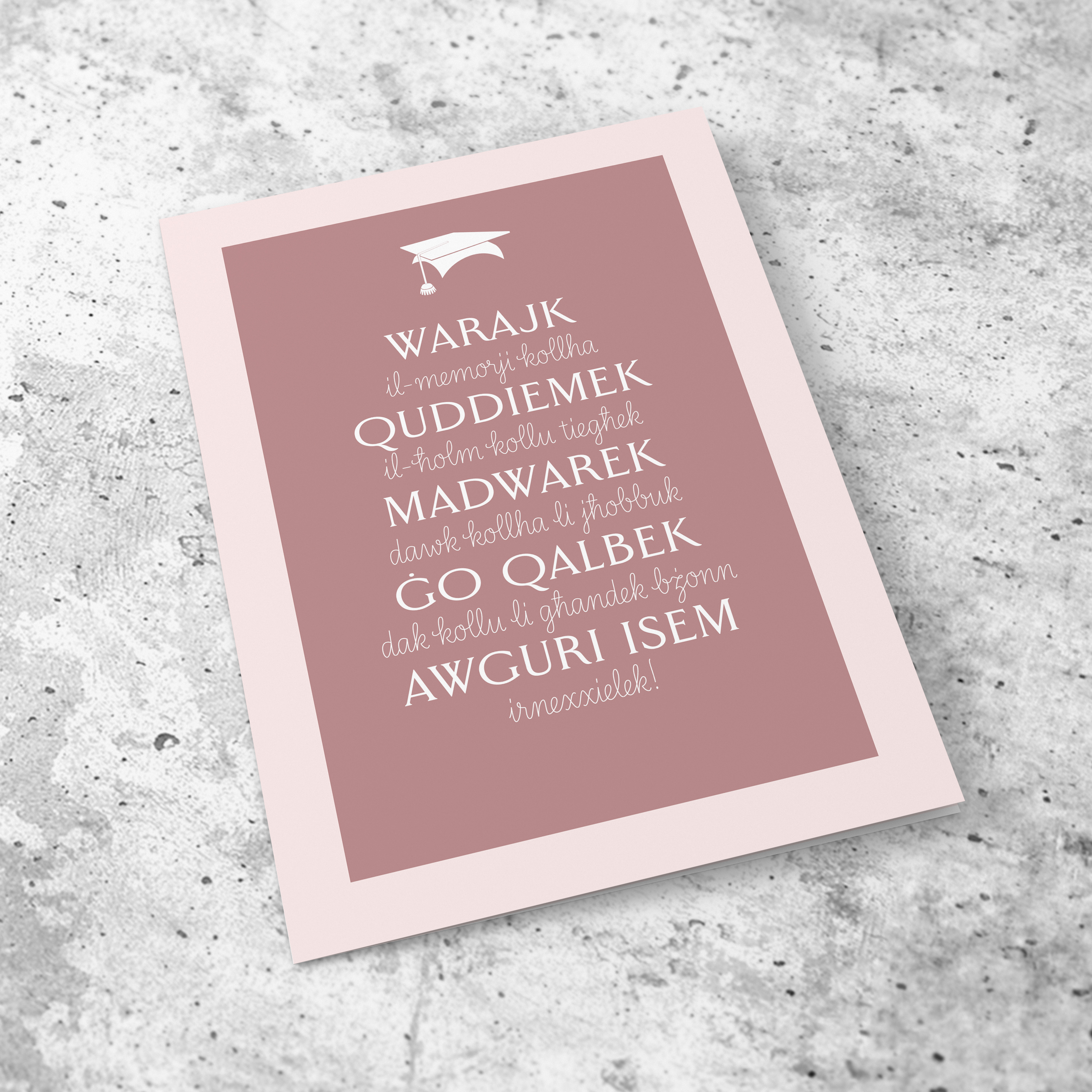 An a5 graduation card in two toned pink colour scheme with a special message in Maltese (Personalisable)