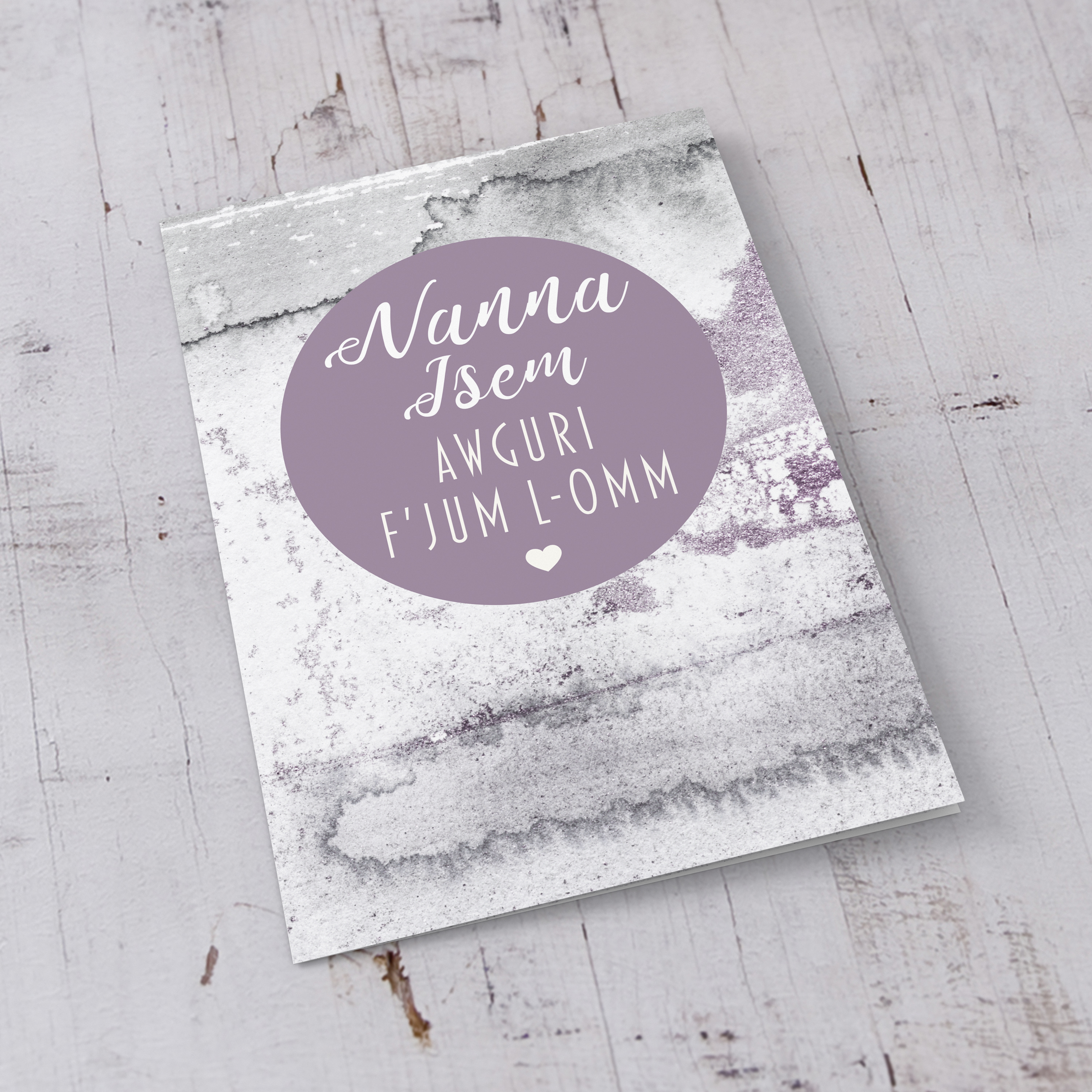 An A5 mother's day card featuring a watercolour background with purple circle for Grandma in Maltese 
