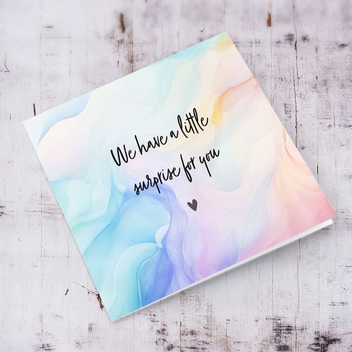 Water colour background baby announcement card - We're going to have a baby!