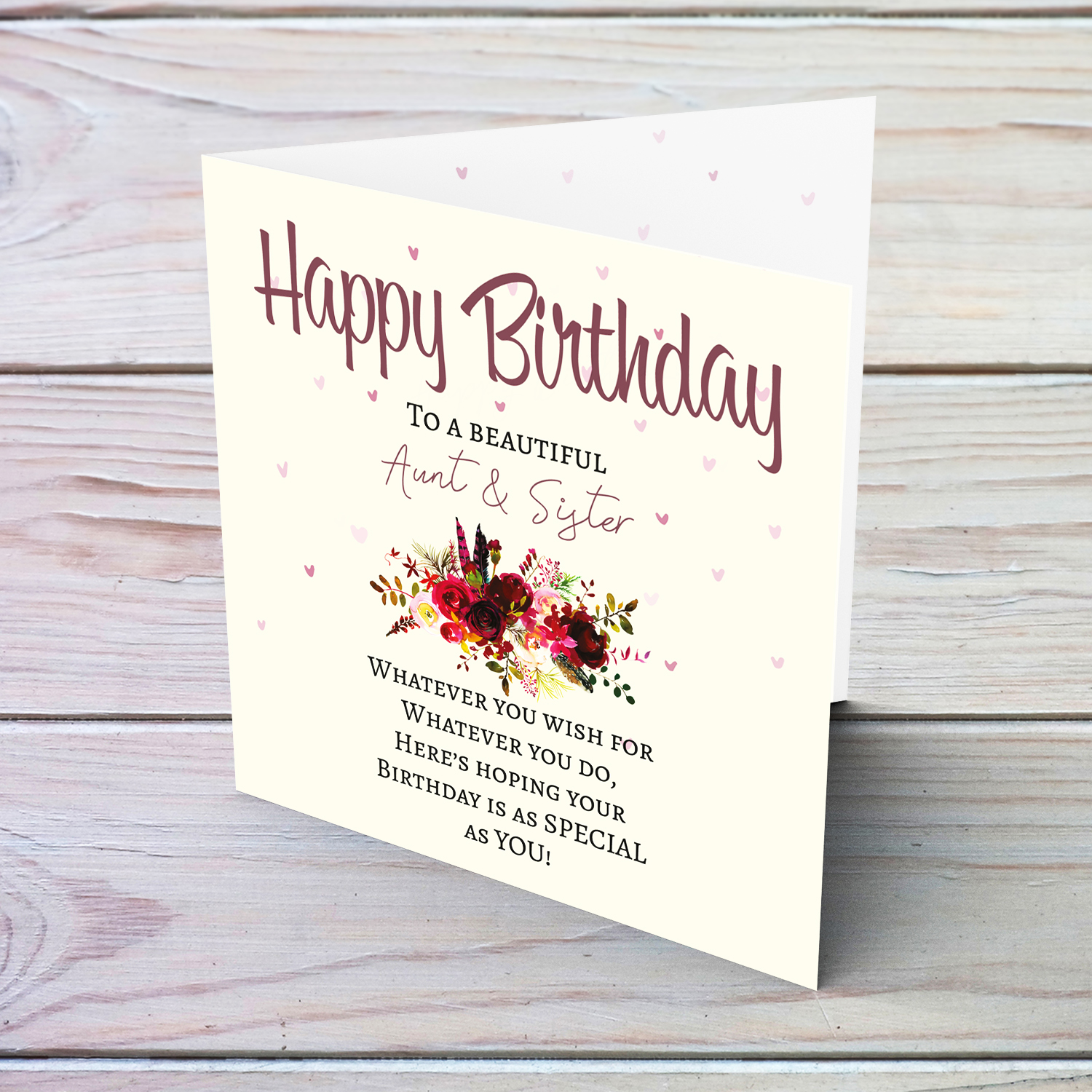 A birthday card with a special message with red tones colours and scattered hearts to a beautiful aunt and sister in English