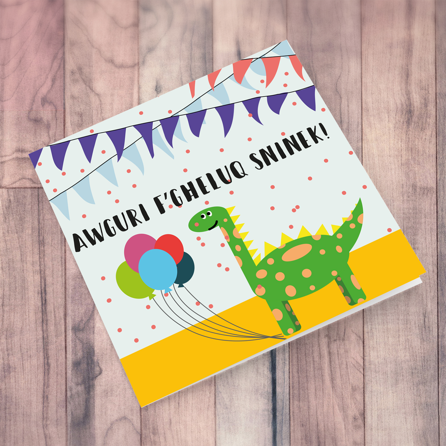 Dinosaur themed birthday card with balloons and bunting for boys in Maltese