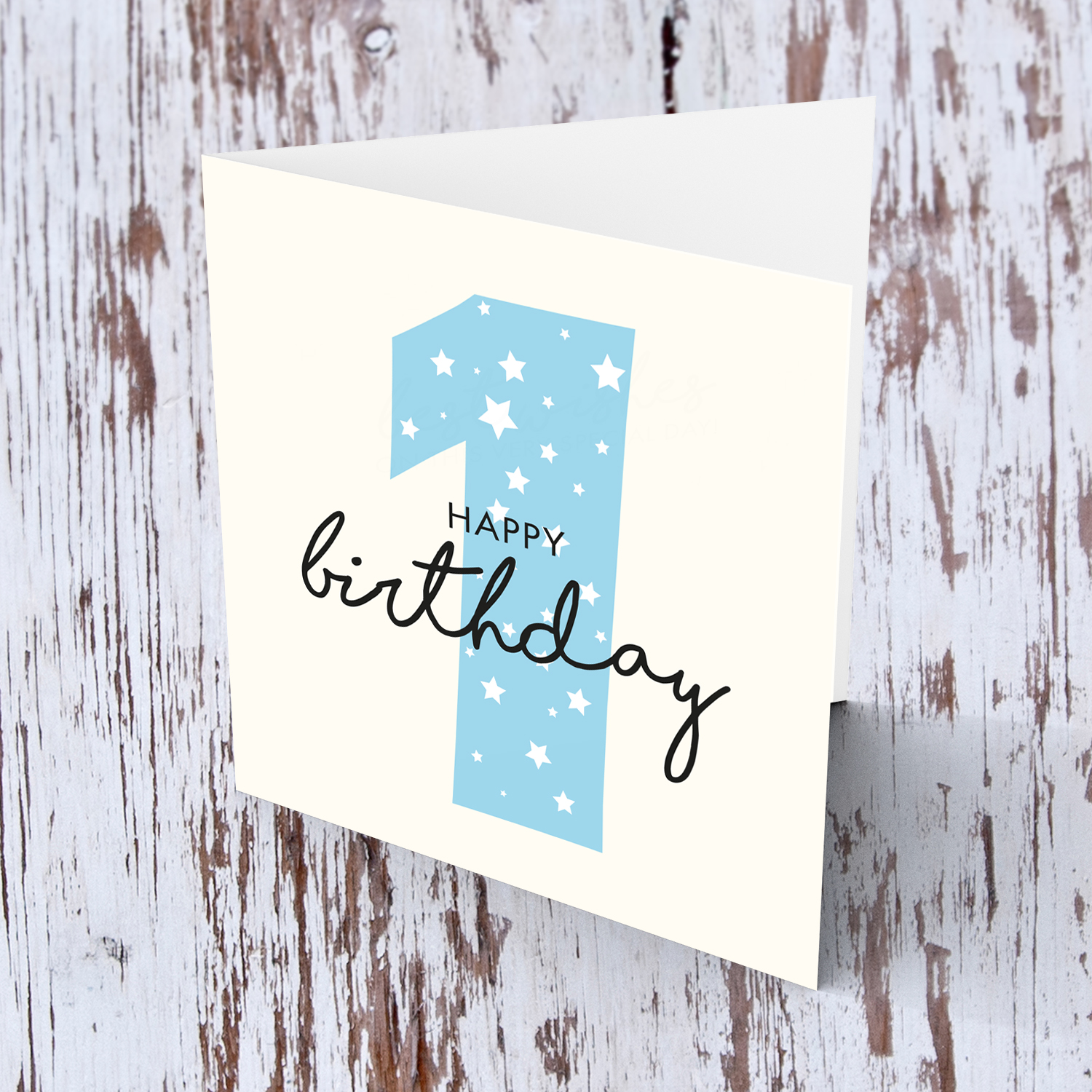 Blue number 1 with scattered white hearts birthday card in English