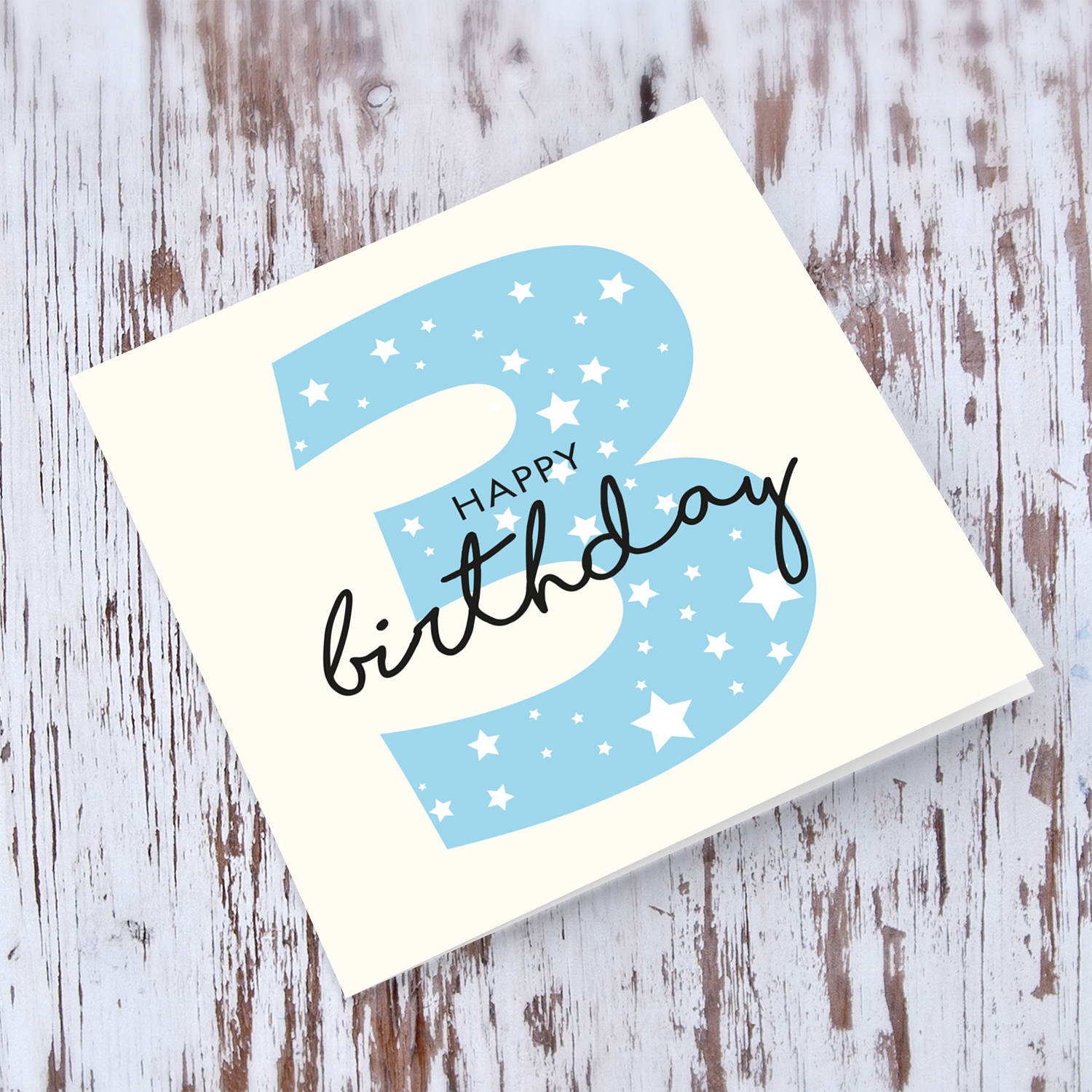 Blue number  3 with scattered white hearts birthday card in English