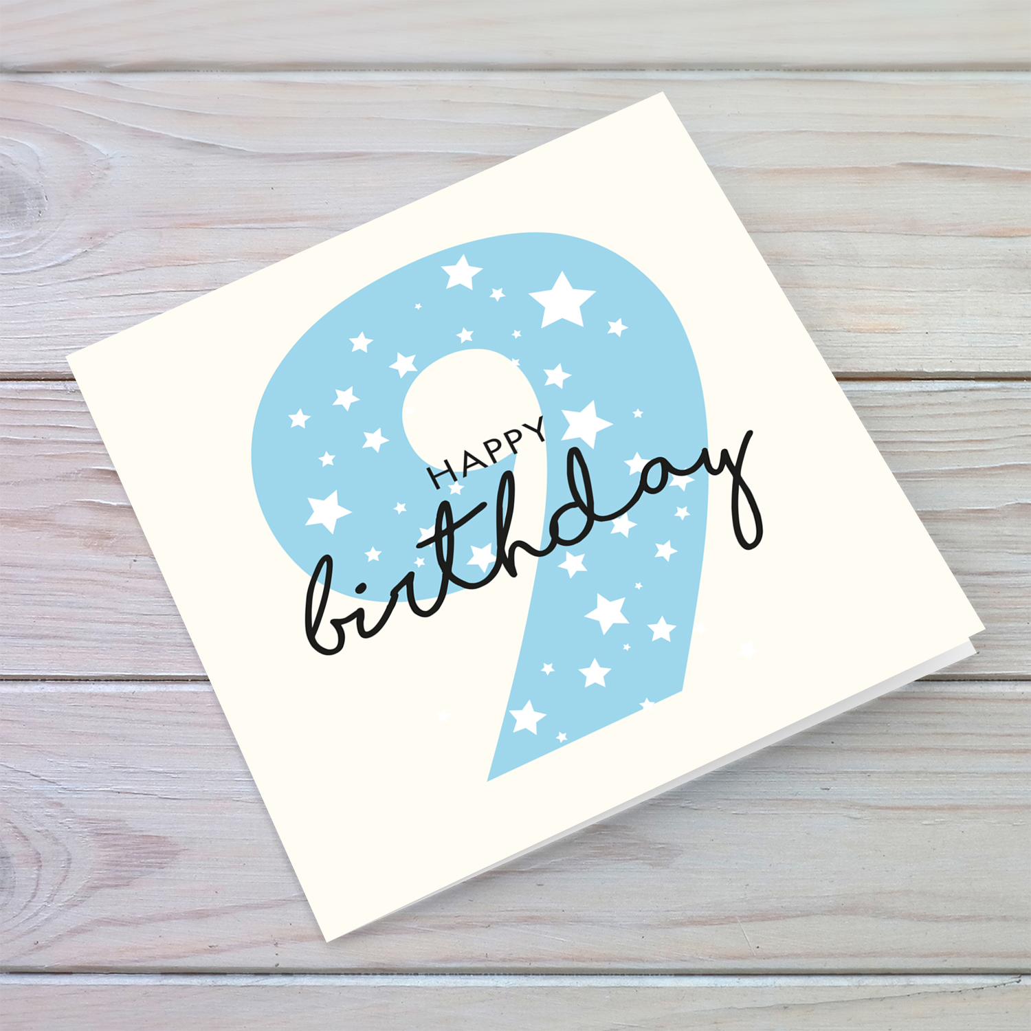 Blue number 9 with scattered white hearts birthday card in English