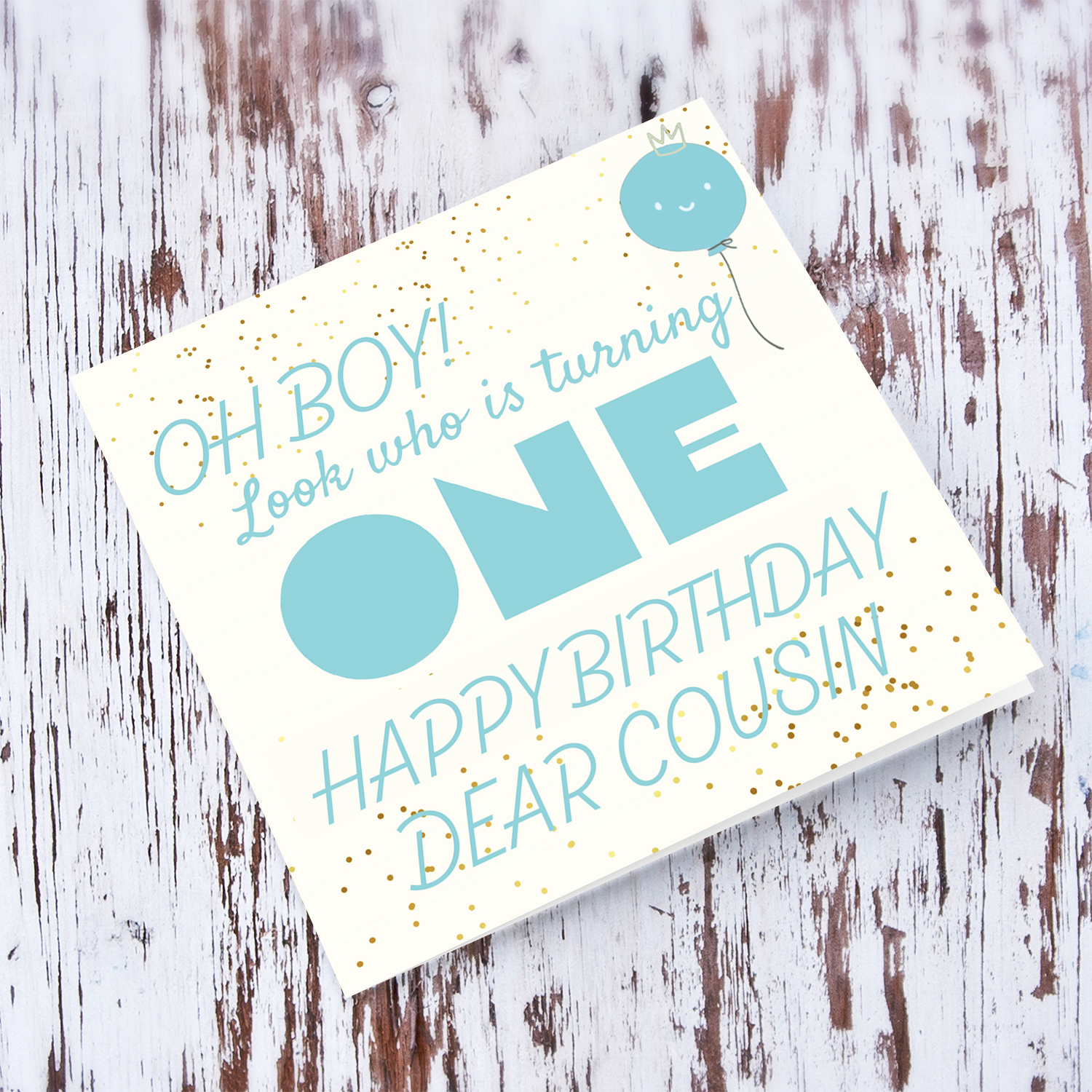 Look who's turning ONE - birthday card for a dear cousin with blue/turquoise text with cute balloon in English