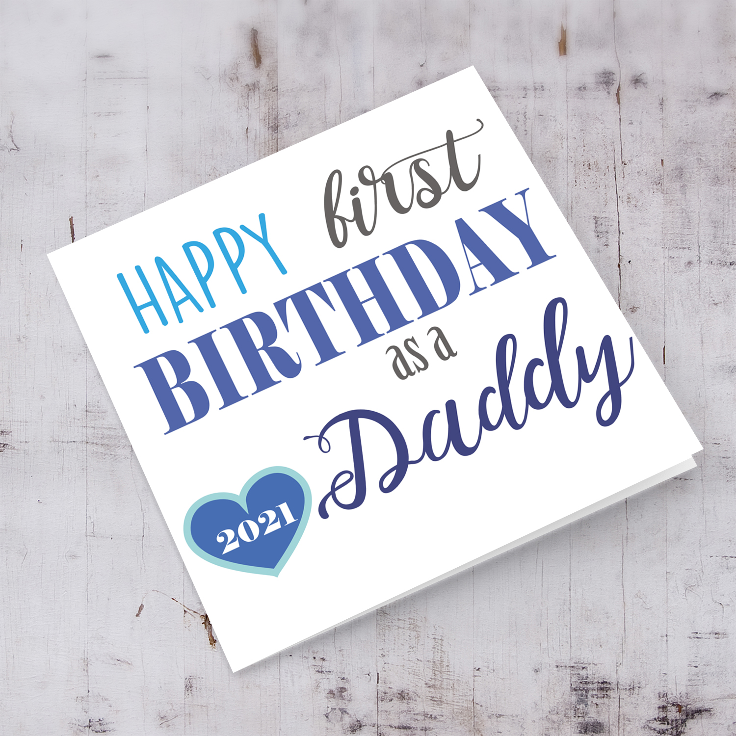 First Birthday as a daddy card with heart, in blue tones
