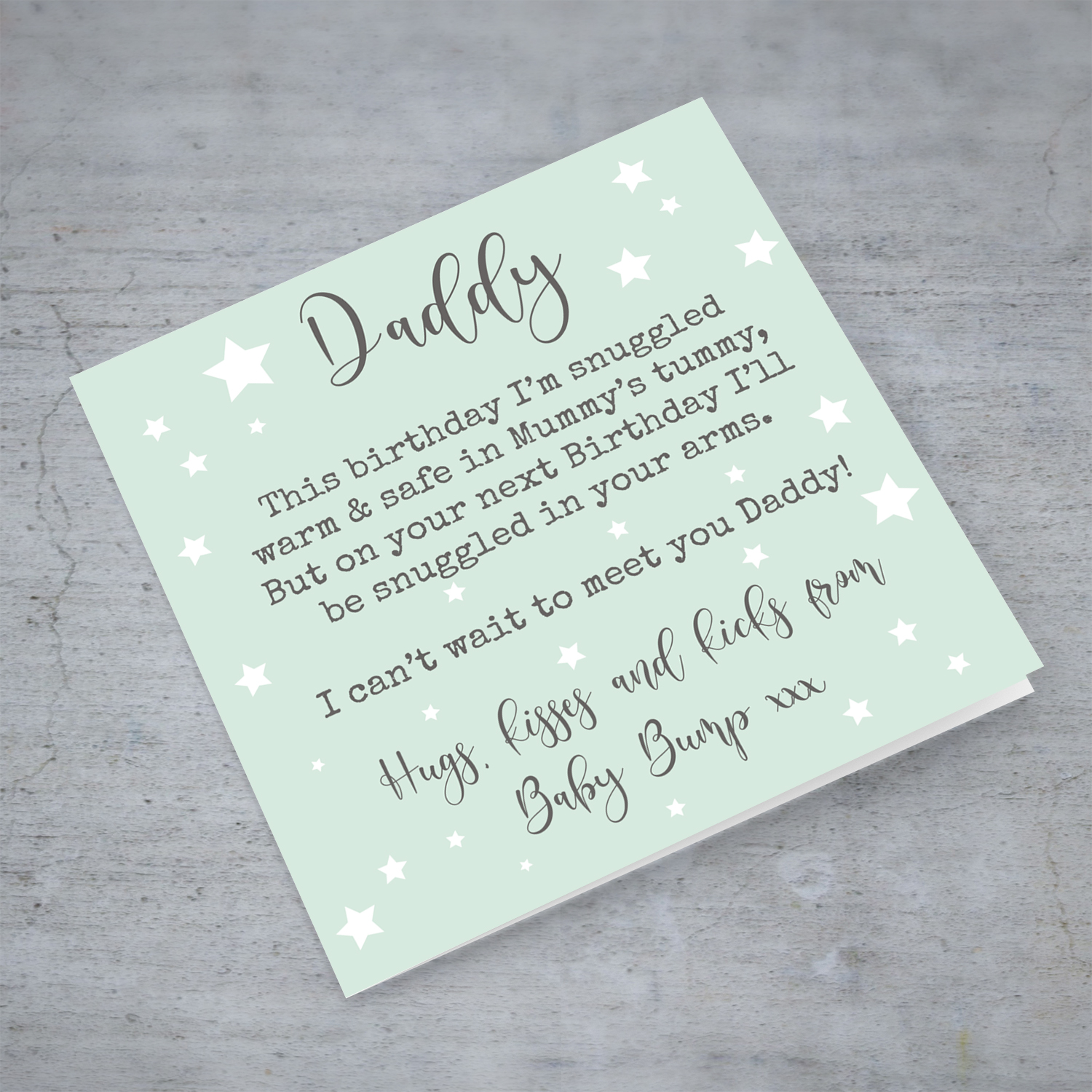 Daddy to be birthday card in pastel green background with scattered stars in English
