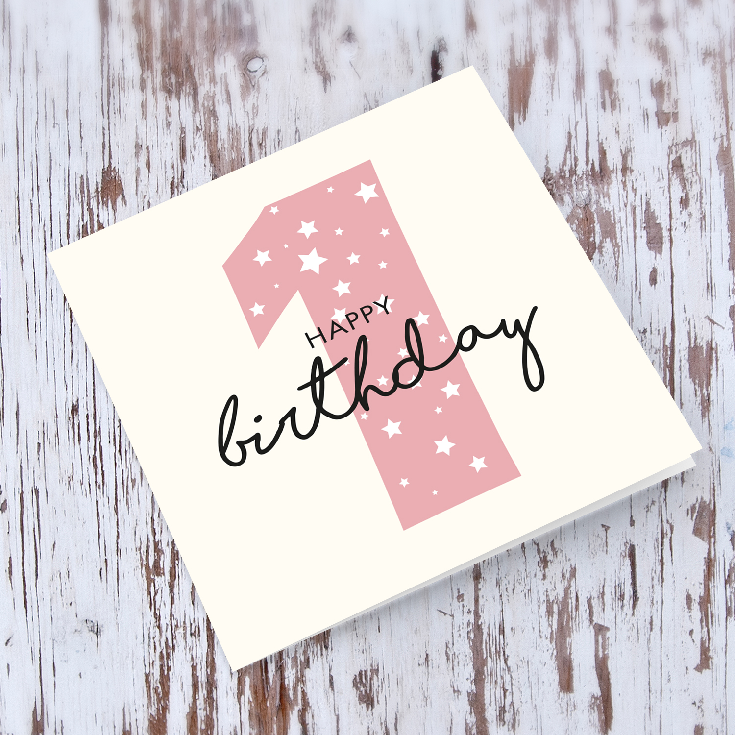 Pink number 1 with scattered white hearts birthday card in English