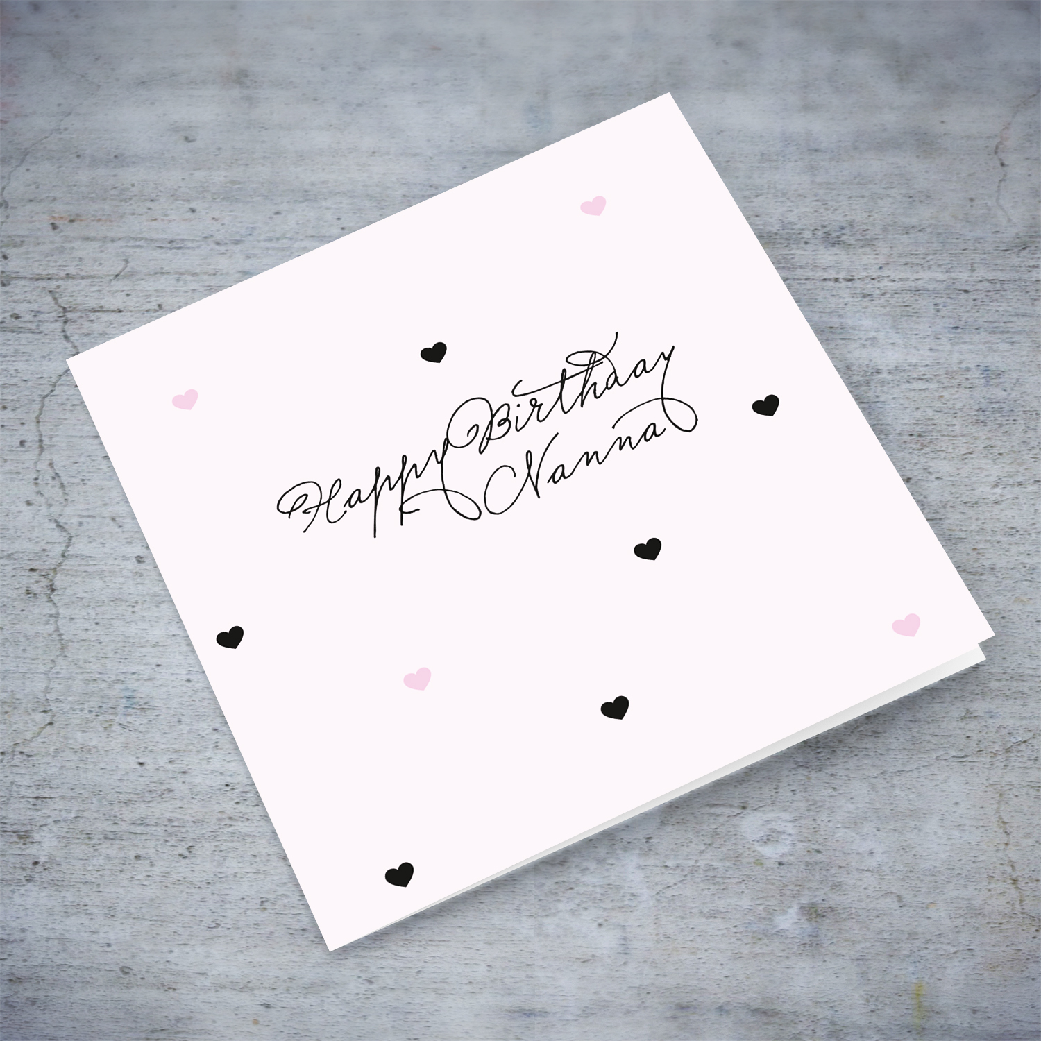 Light pink with scattered hearts birthday card for Grandma in Maltese / English