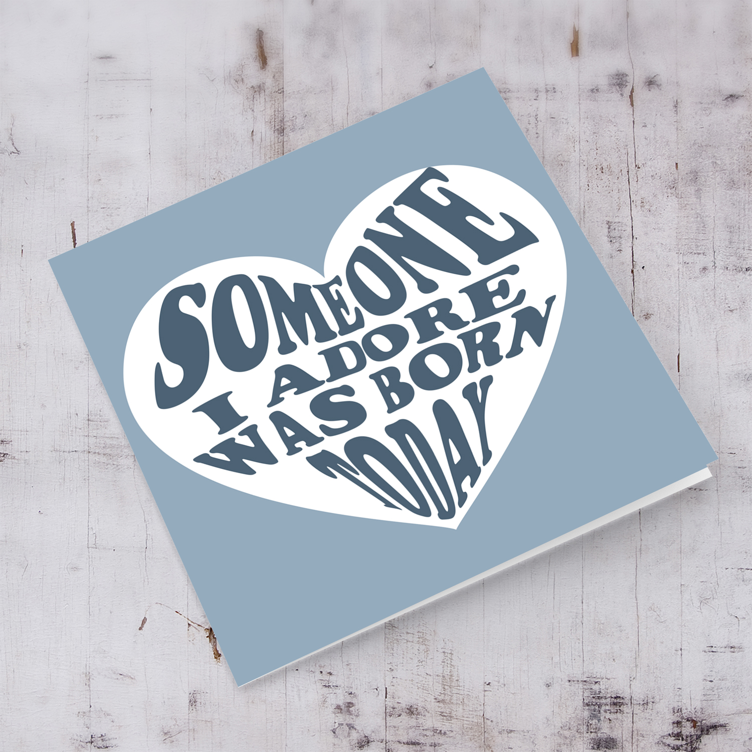 Someone I adore was born today birthday card in blue tones in English