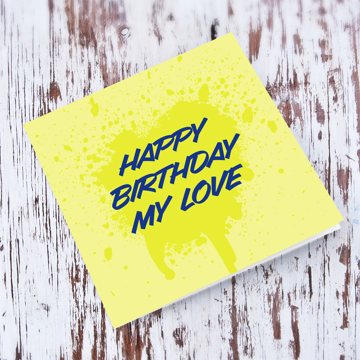 Yellow splattered paint background with blue text birthday card for "My Love" in English
