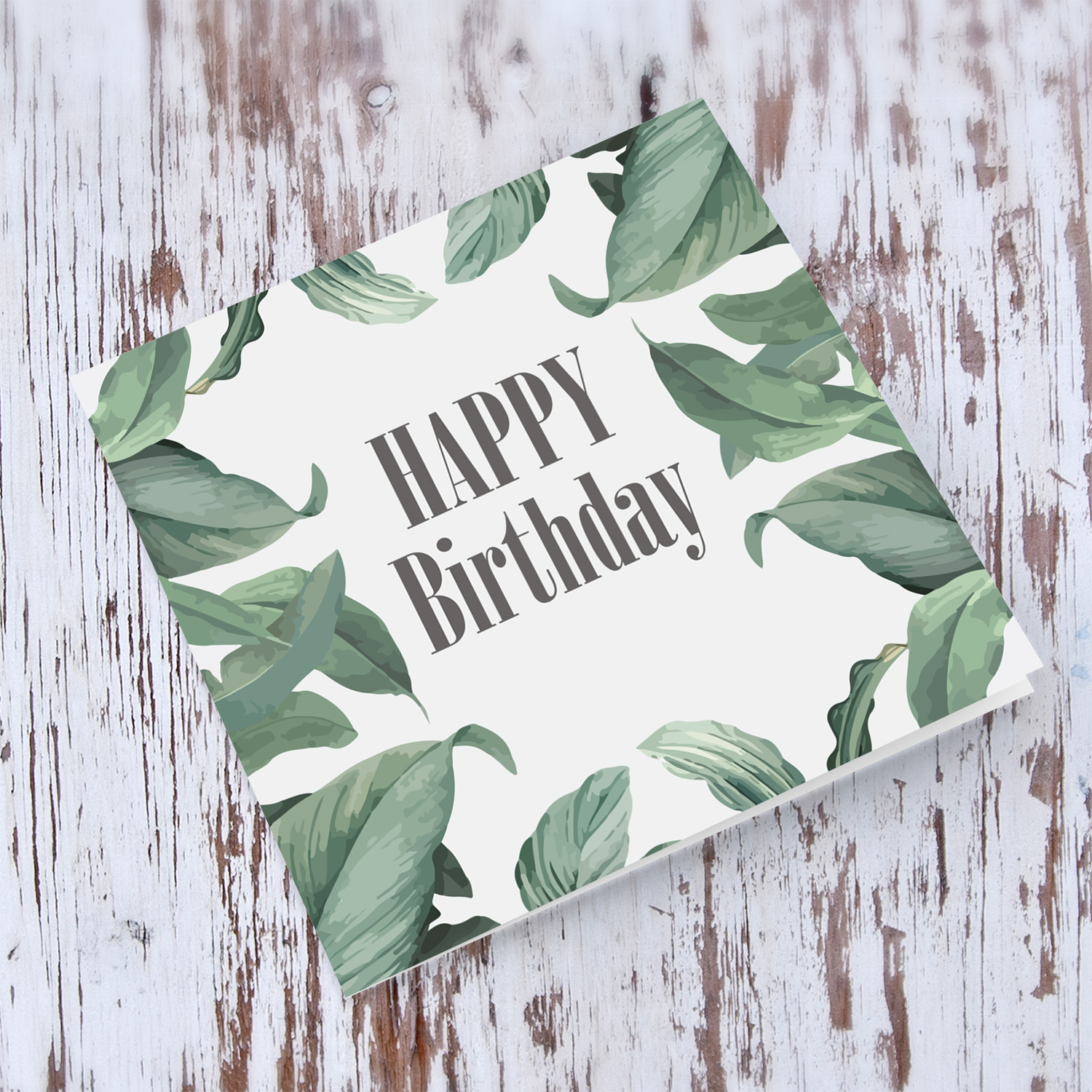 Green leaves themed birthday card in English