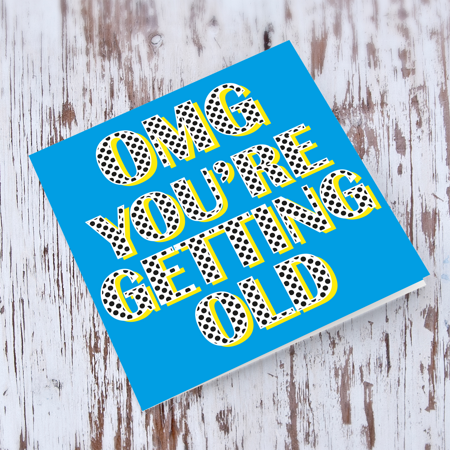 Blue background with polka dot wording you're getting old birthday card in English