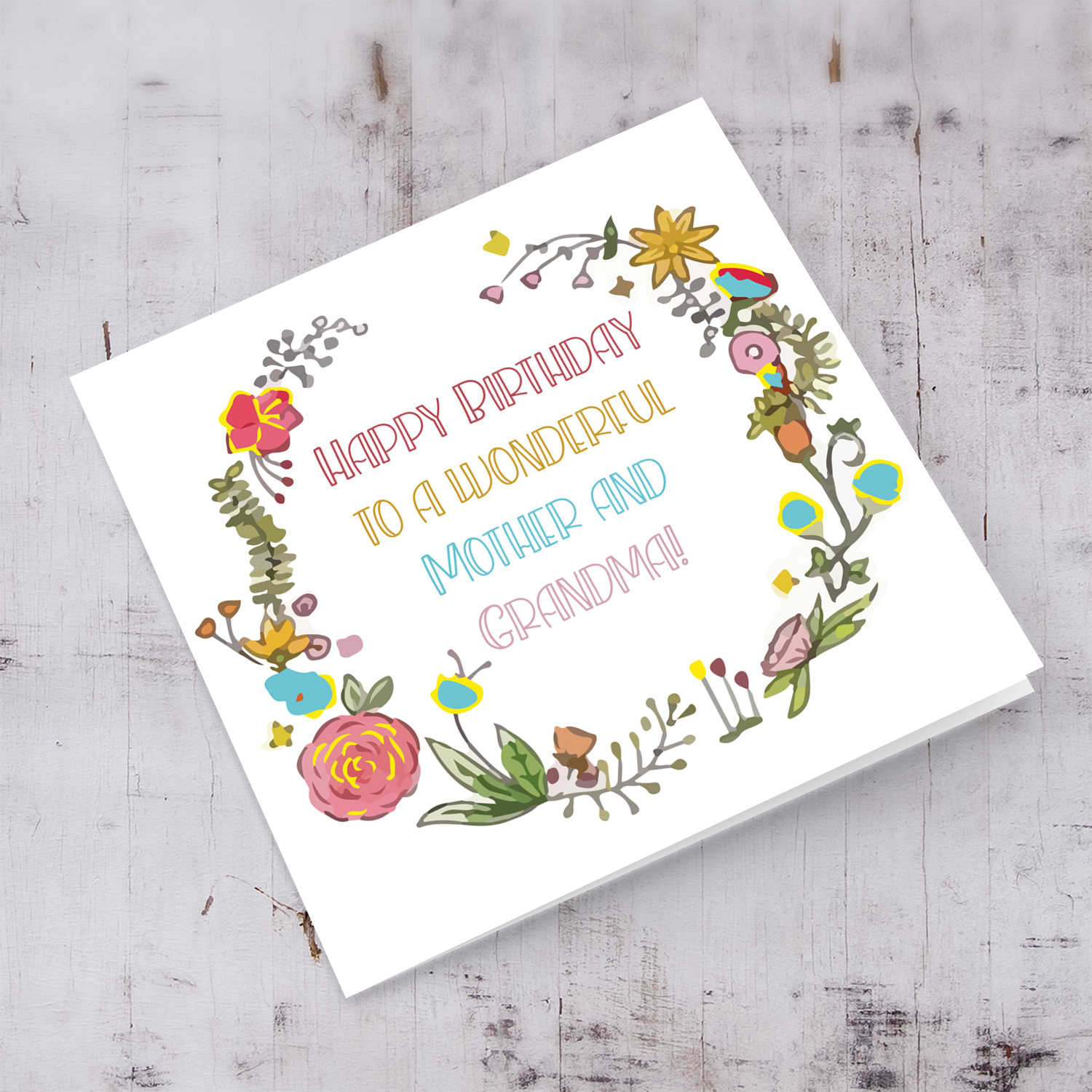 Colourful wreath with various flowers birthday care for Mum & Grandma in English