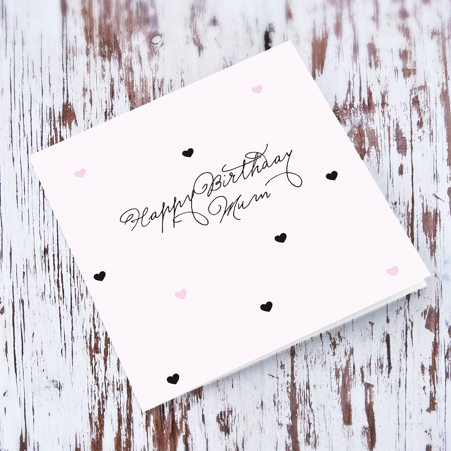 Light pink with scattered hearts birthday card for Mother in English