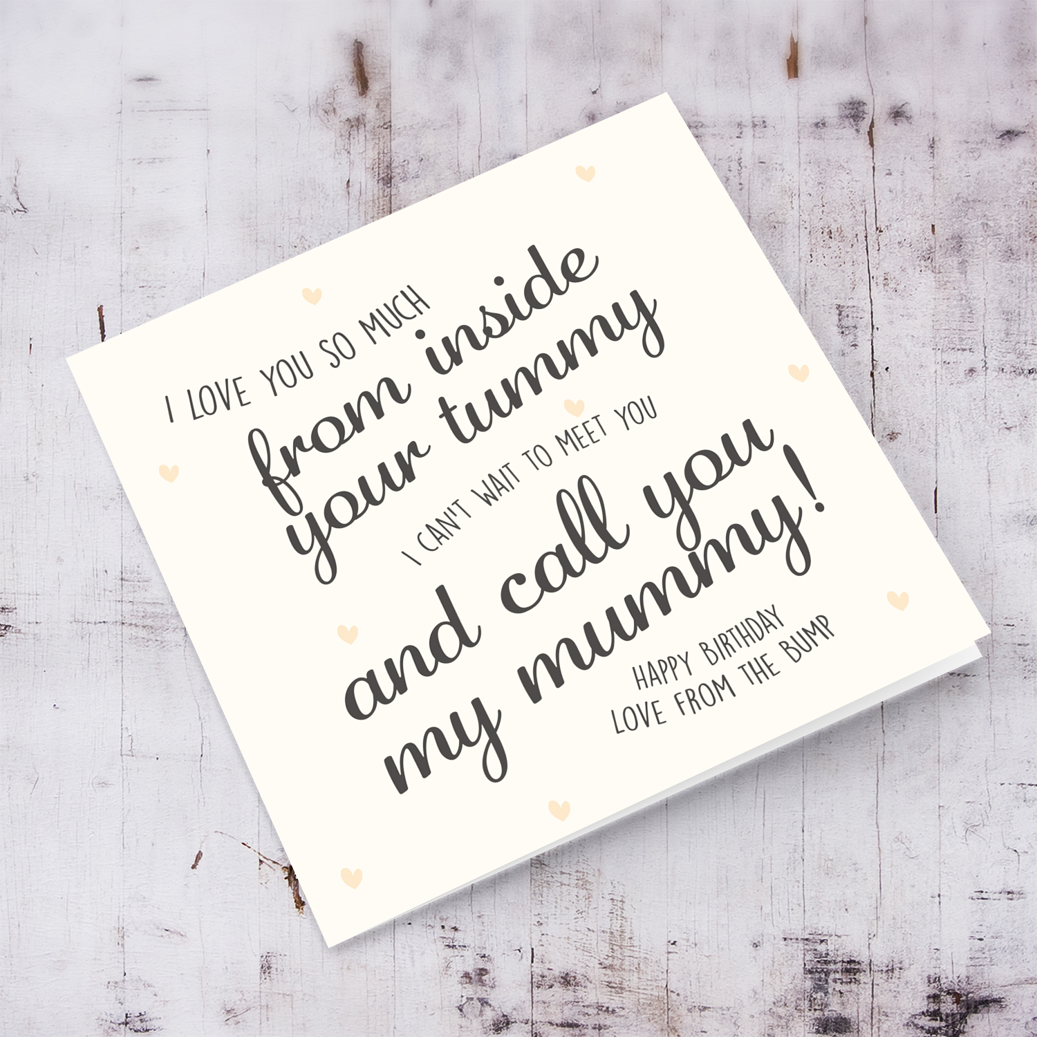 Cute birthday card for mummy to be in light cream background and scattered hearts in English