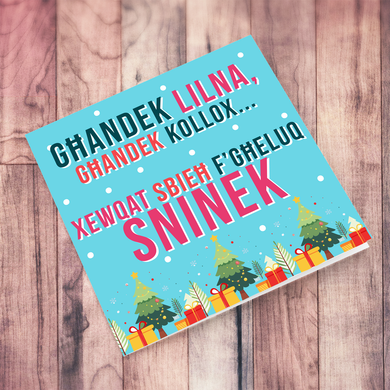 Funny Christmas & Birthday card with blue background and colourful text in Maltese (PLURAL)