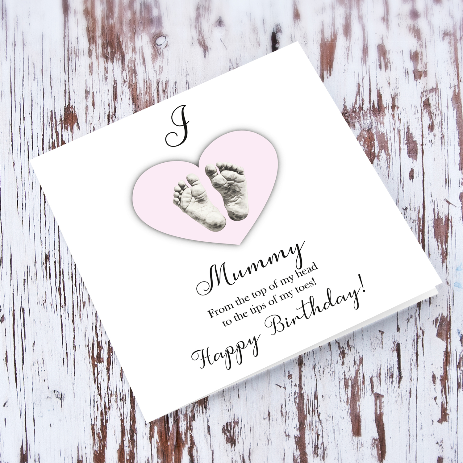 A cute baby footprint birthday card for mummy, I love mummy, in a light pink heart in English
