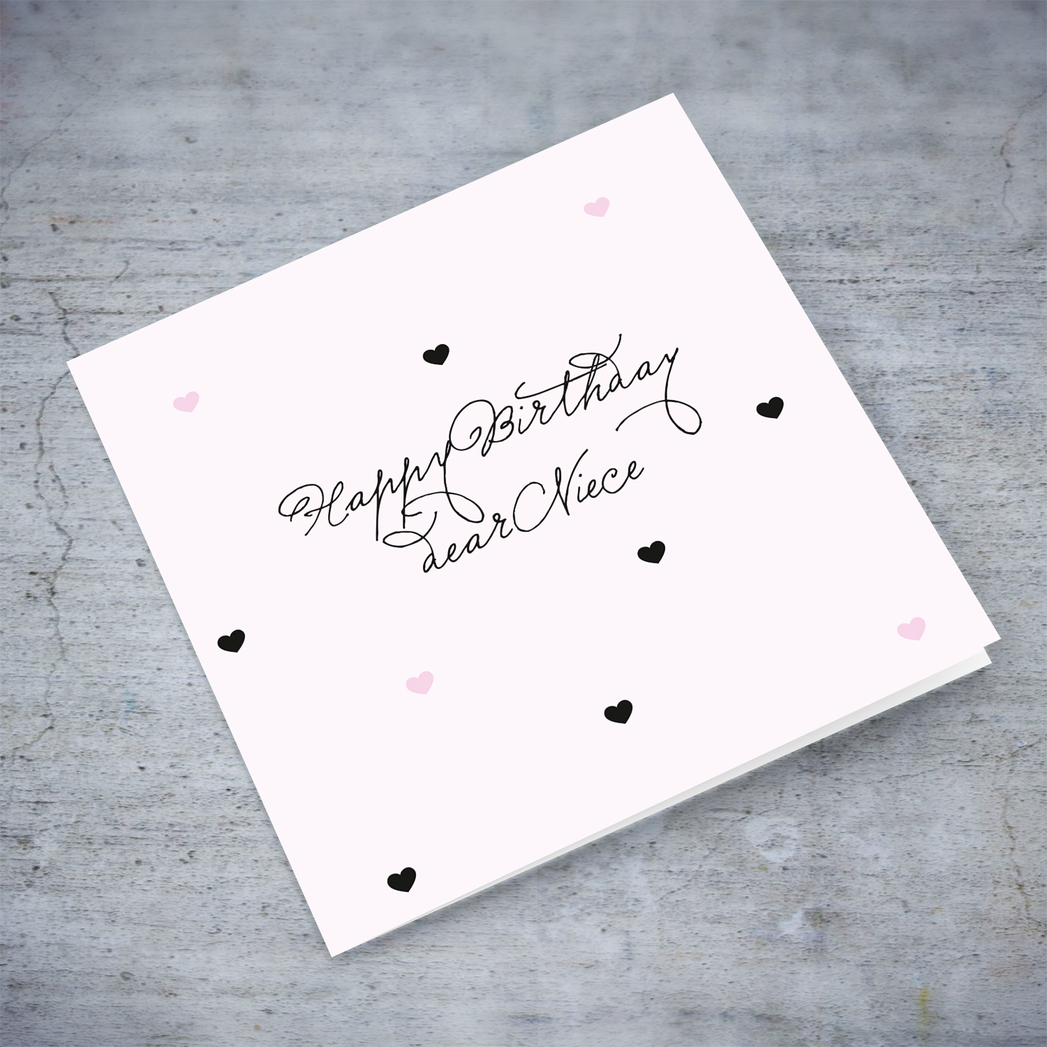Light pink with scattered hearts birthday card for Niece in English