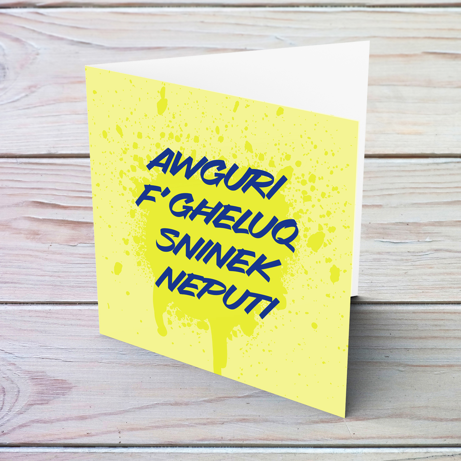 Yellow splattered paint background with blue text birthday card for nephew in Maltese