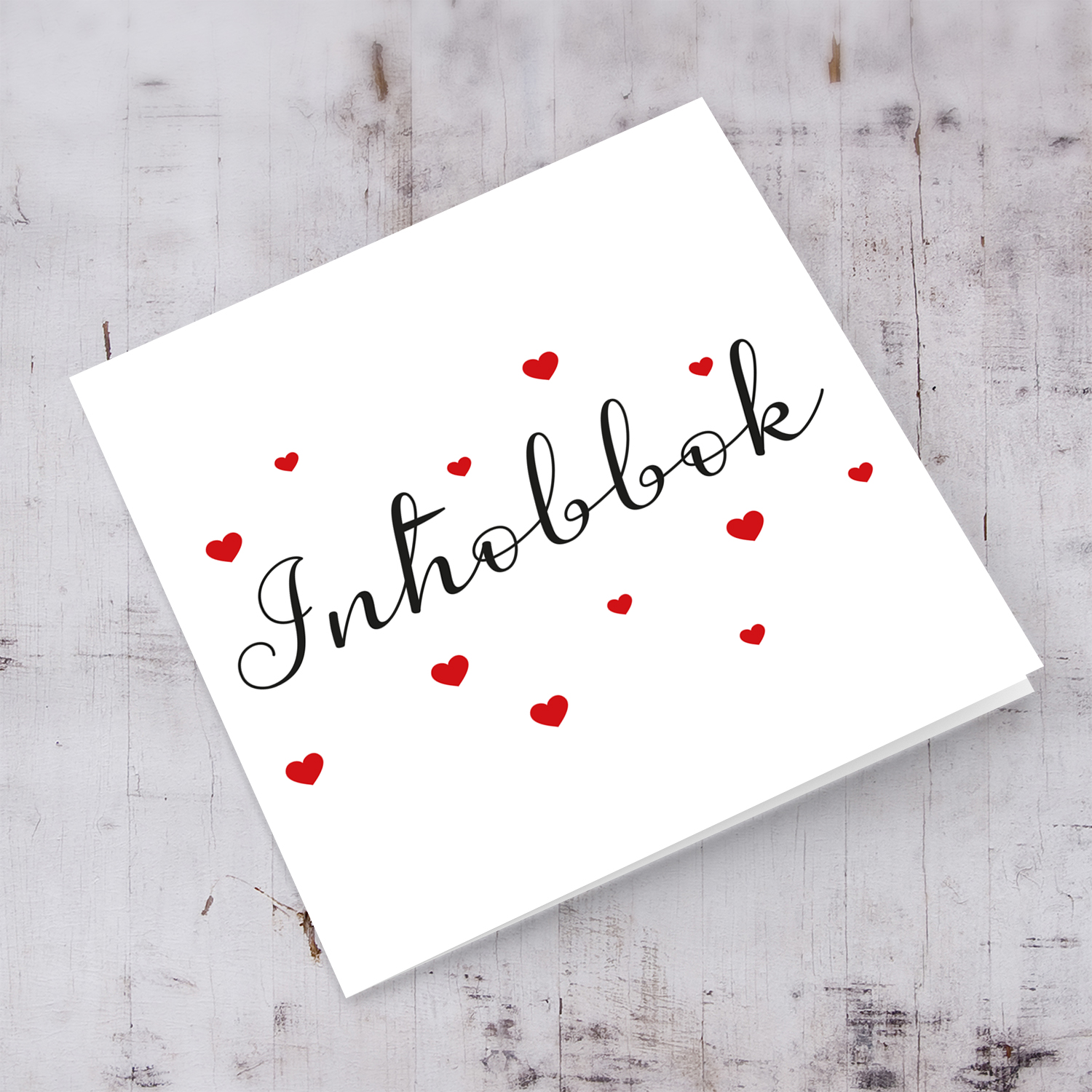 Inħobbok card with scattered red hearts in Maltese