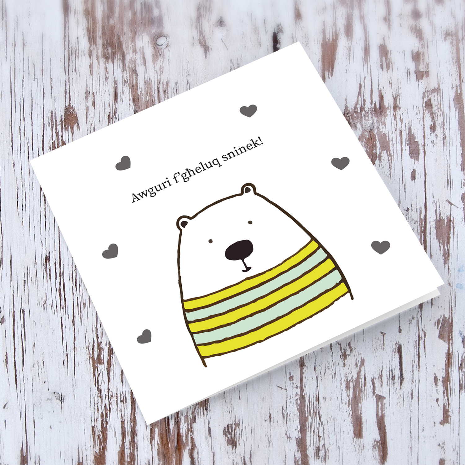 Bear themed birthday card with scattered hearts in Maltese