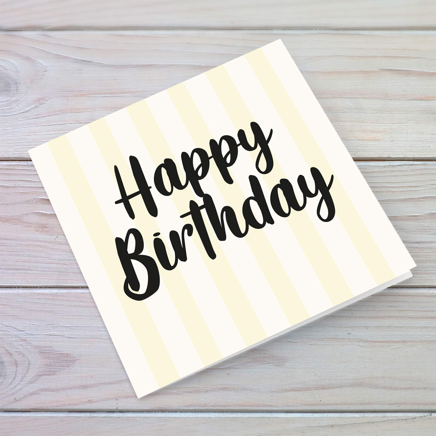Off white and light yellow striped background birthday card in English