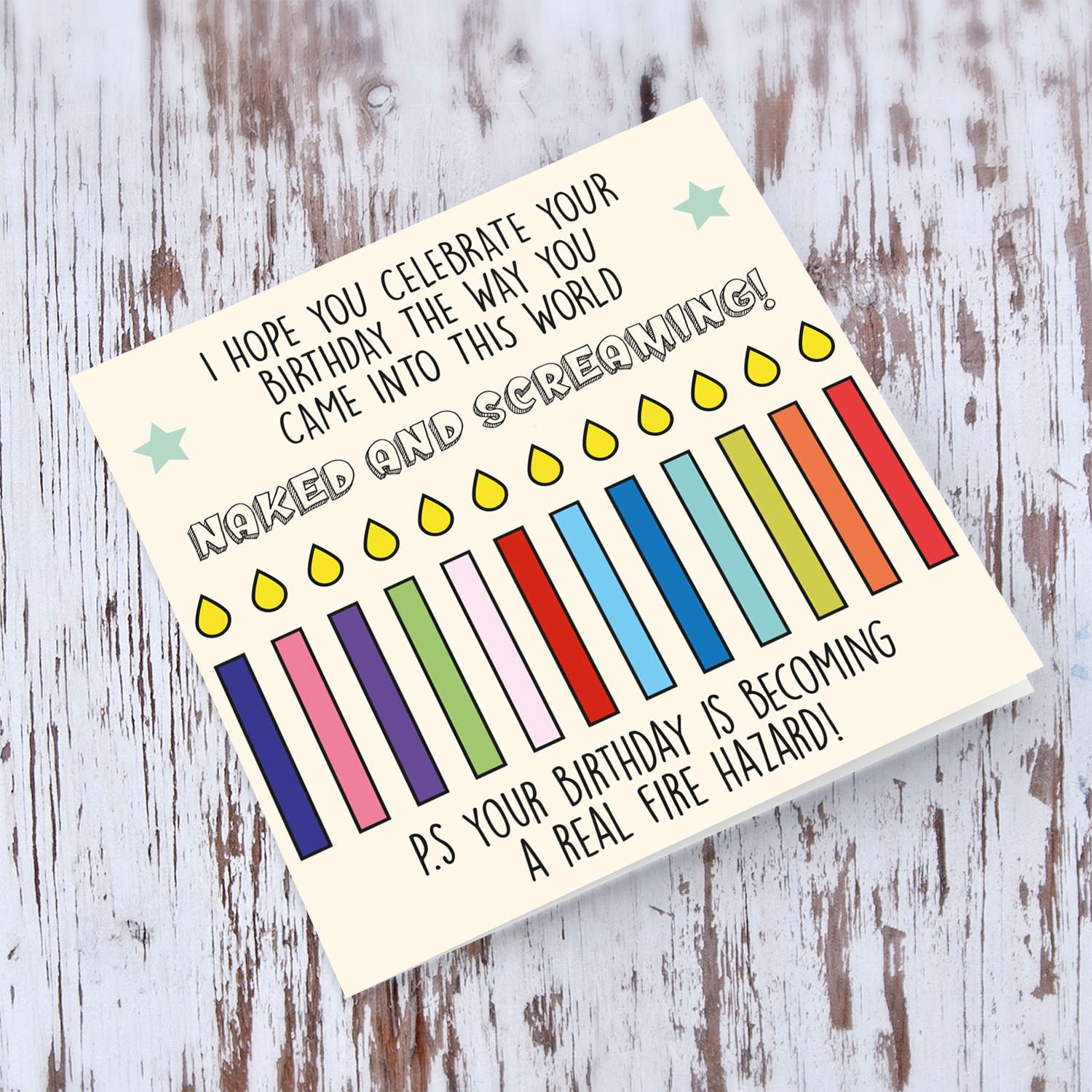 Funny birthday card with a colourful row of candles in English
