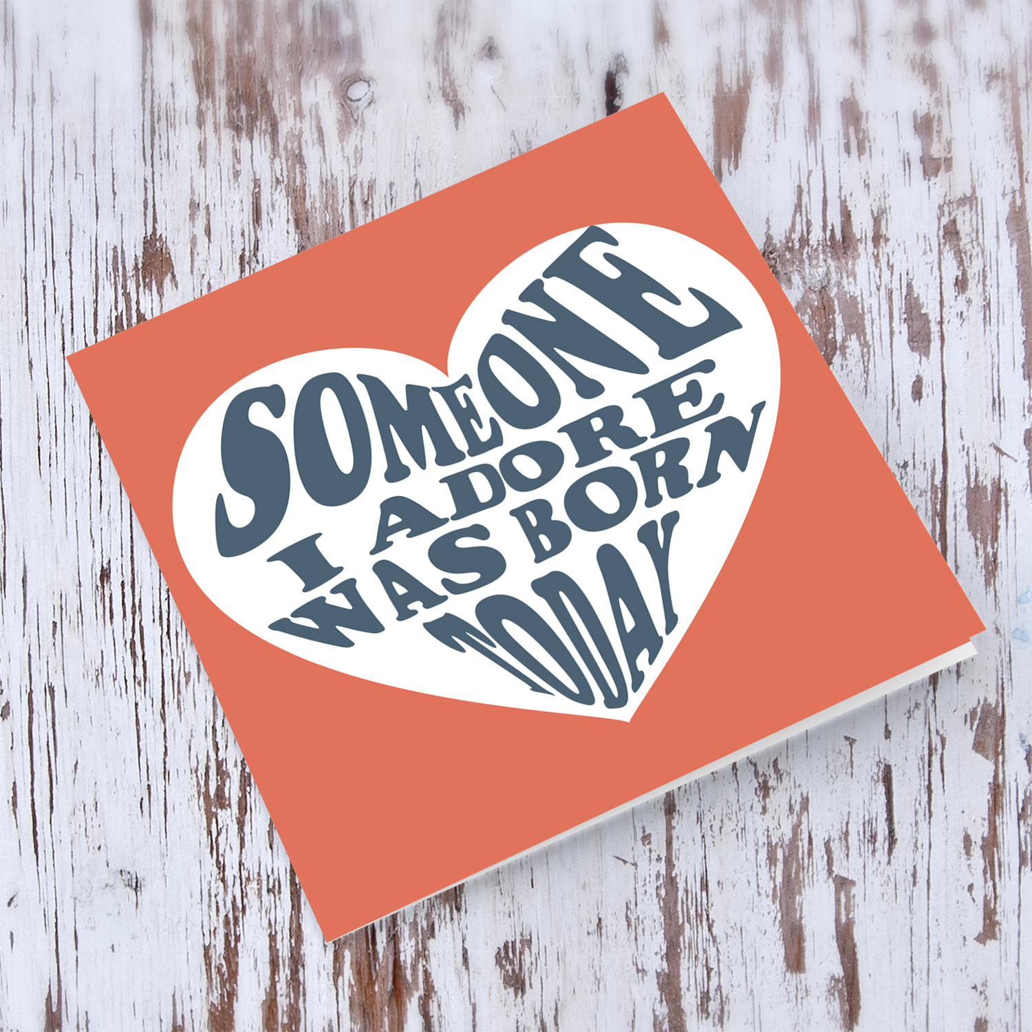 Someone I adore was born today birthday card in coral/orange background in English (Unisex)