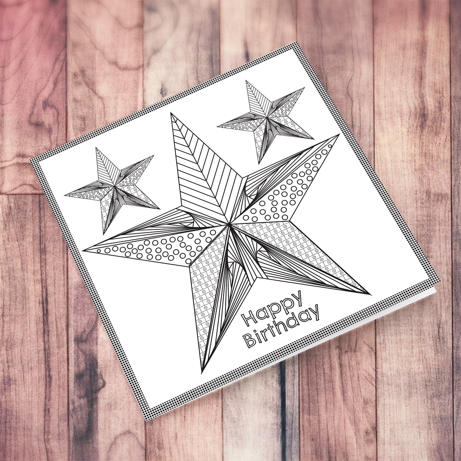 Colouring stars with different patterns themed birthday card in English