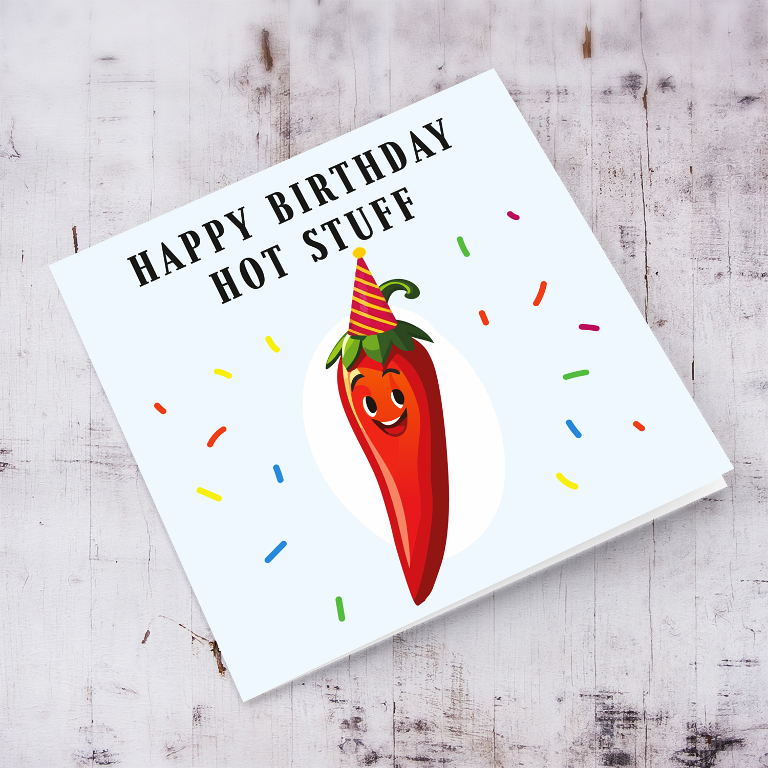 Funny birthday card with chilli pepper wearing party hat in English