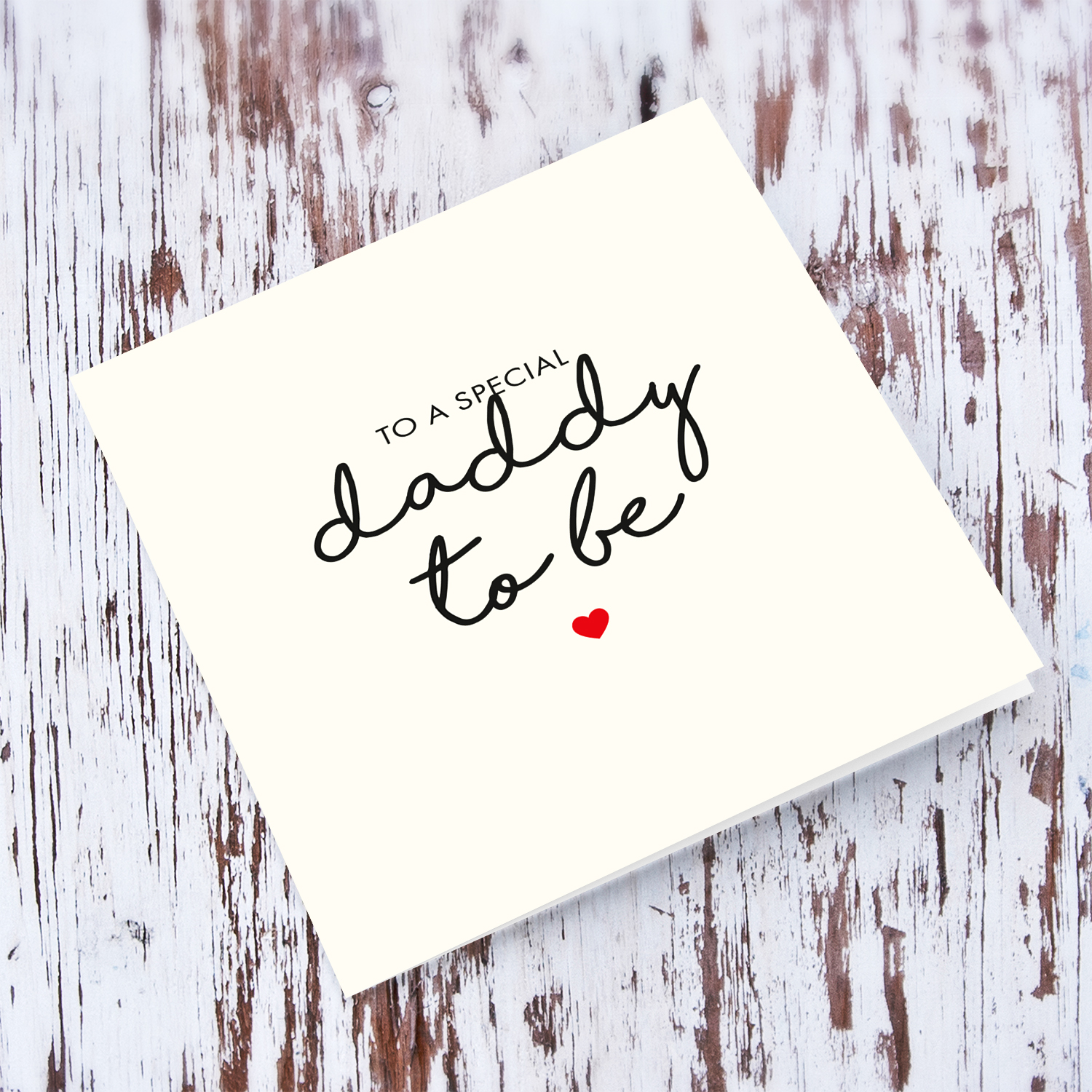 To a special daddy to be minimalist birthday card with red heart in English