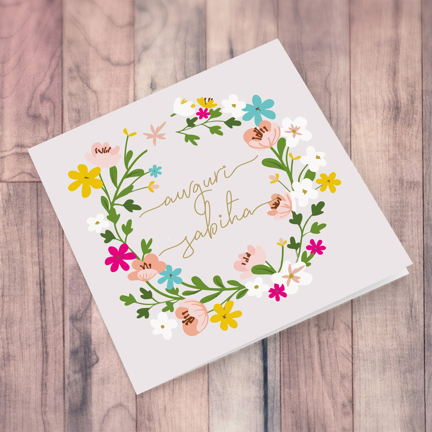 Colourful floral themed birthday card with light pink background in Maltese