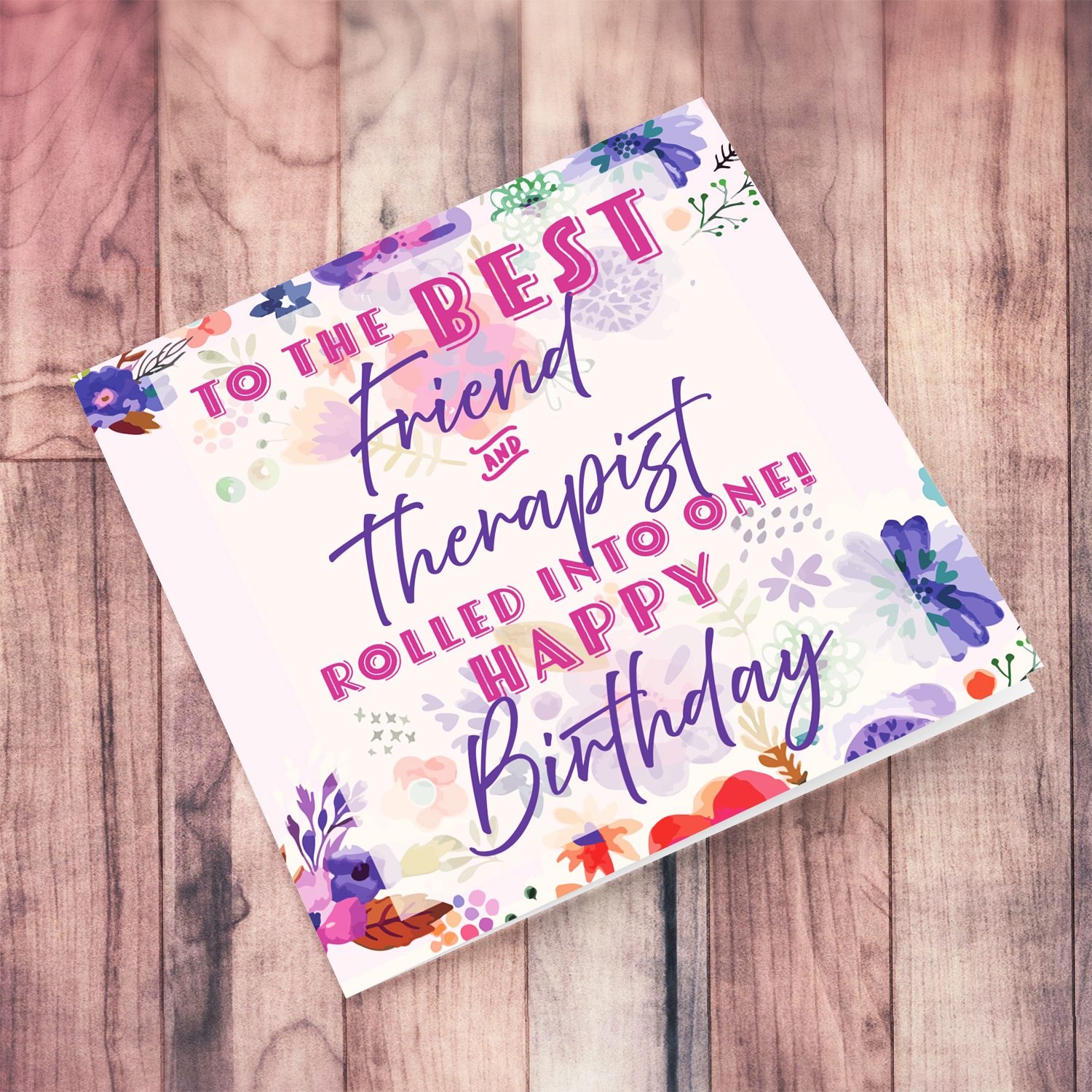 A beautiful birthday card featuring purple flowers, pink and purple text for bestie in English