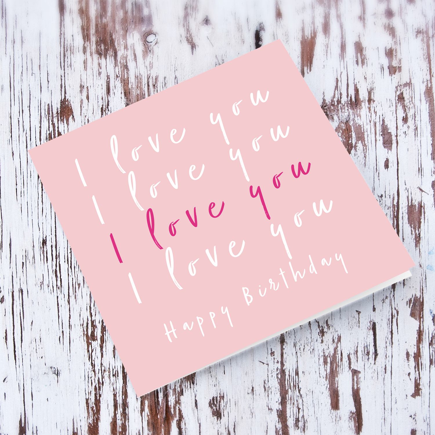 Pink background birthday day card for someone you love with repeated I love you message in English