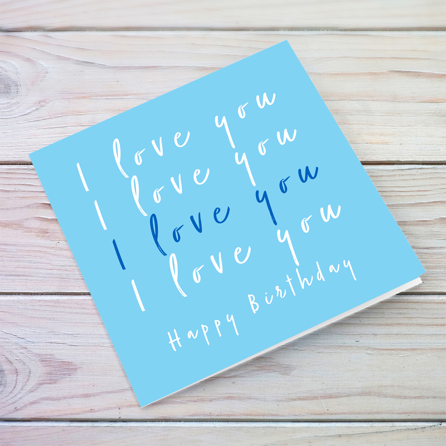Blue background birthday day card for someone you love with repeated I love you message in English