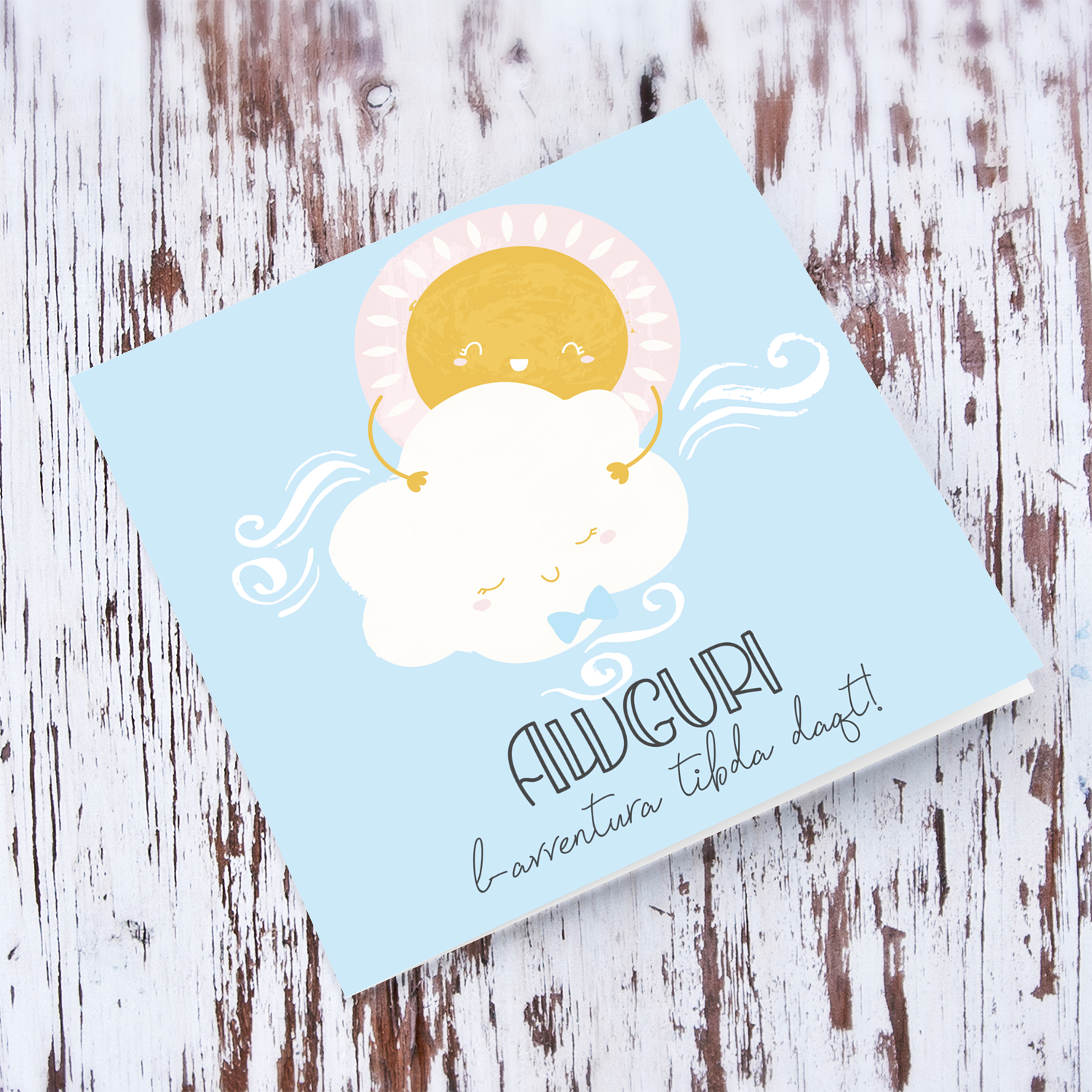 Light blue background with sun hugging cloud with blue bow baby shower card in Maltese