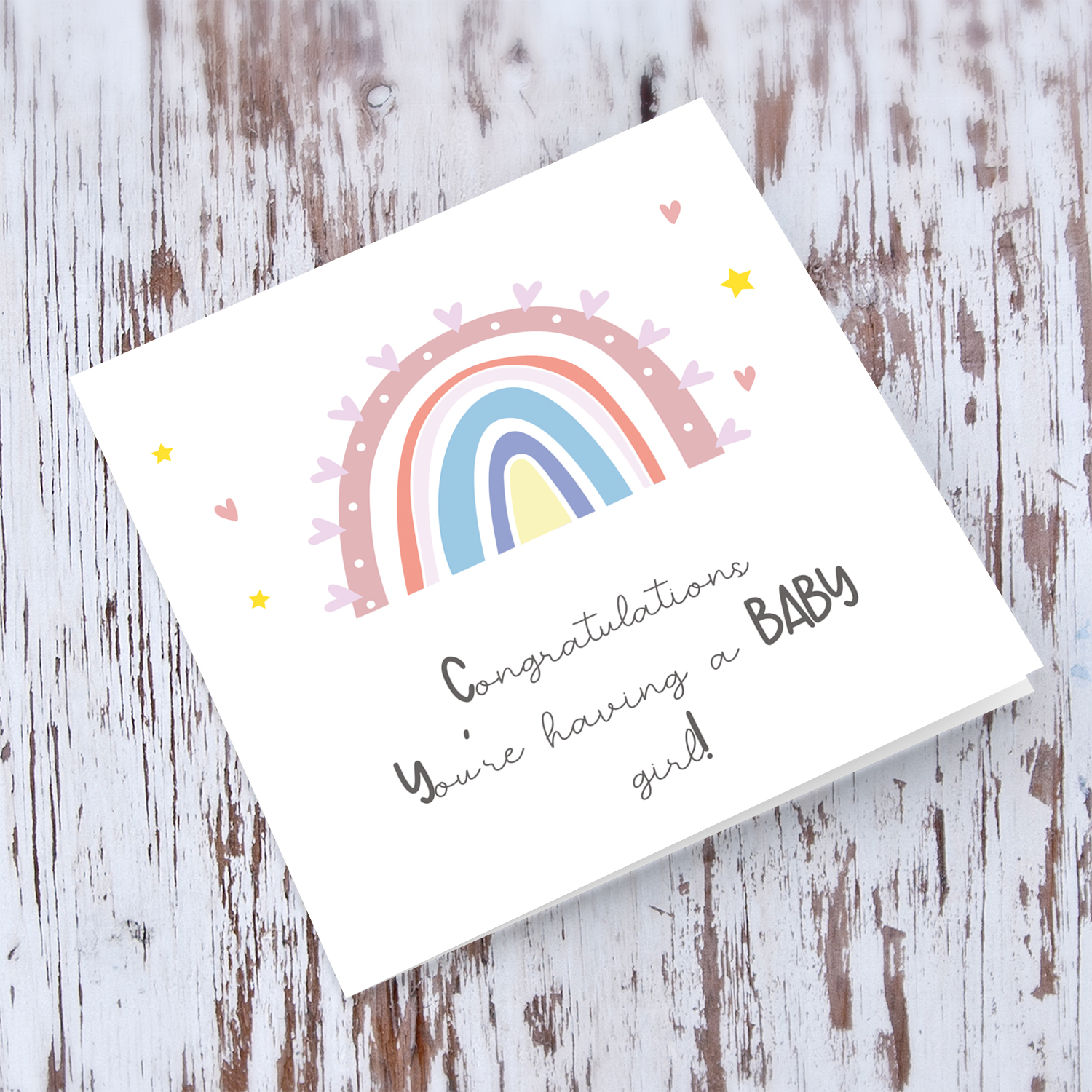 Rainbow themed baby shower card for baby girl in English