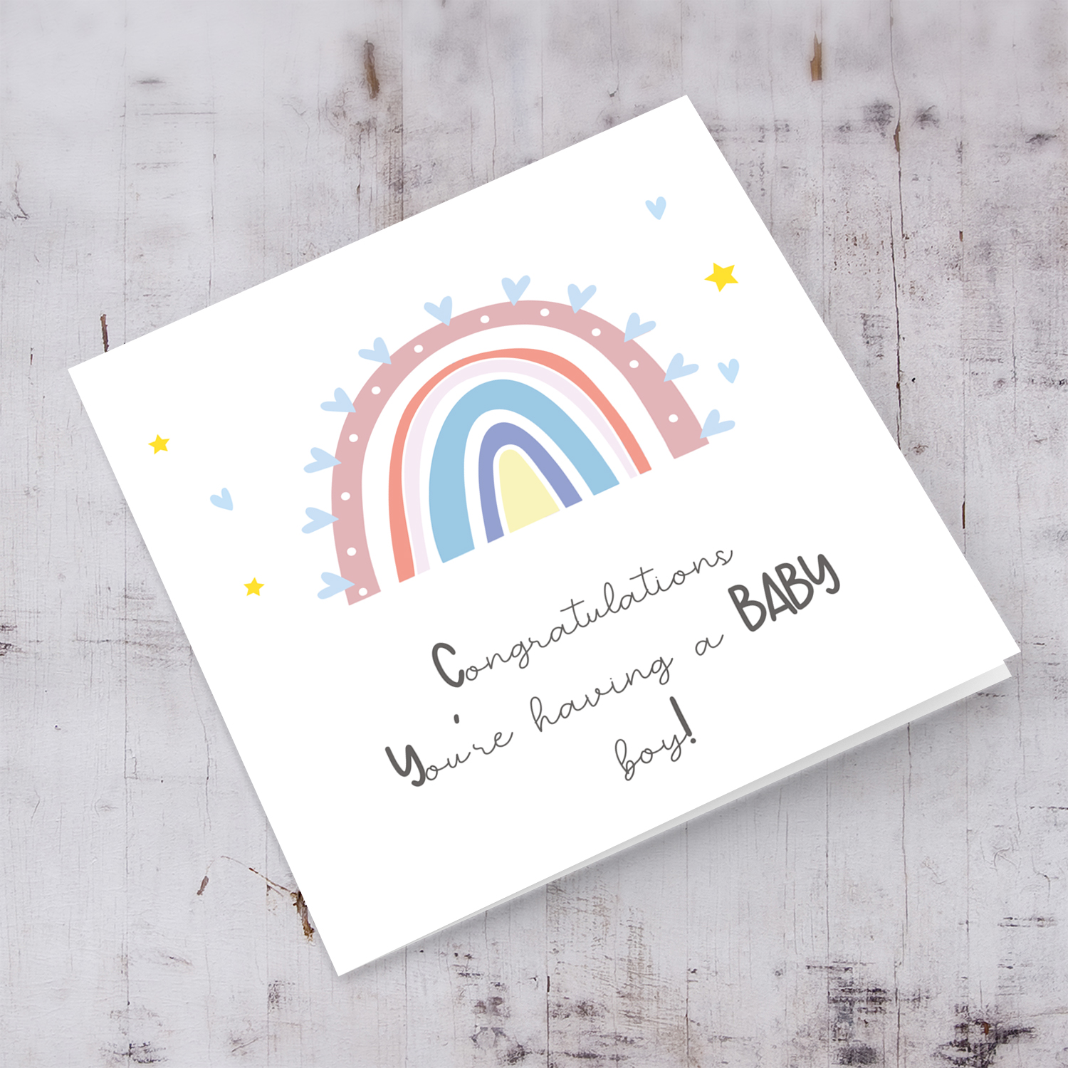 Rainbow themed baby shower card for baby boy in English